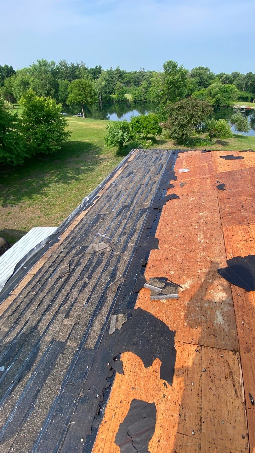 Asphalt Roof Replacement and Aluminum Gutter Installation by Custom Installations