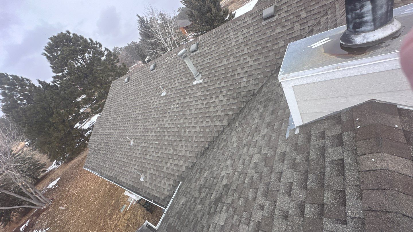 Residential Roofing Installation using Atlas Pinnacle Impact Weathered Wood by Blue Peaks Roofing LLC 