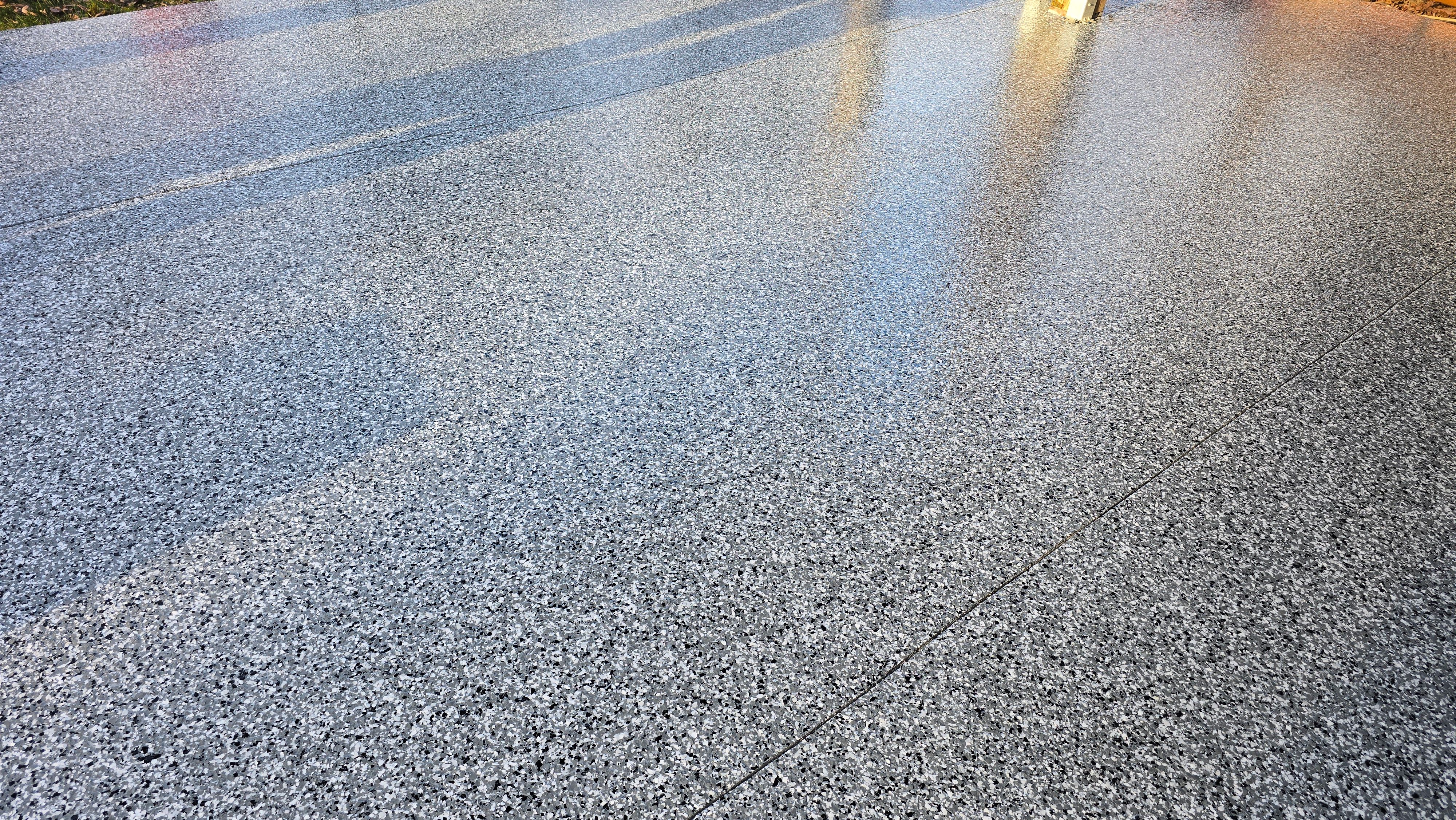 Garages, Basement & Patio Using Wombat & Obsidian by Elite Floor Solutions