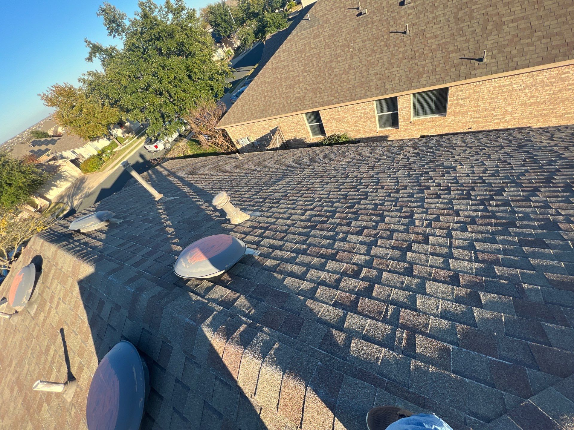 Complete Roofing Replacement and Hail Damage Restoration in Round Rock by Caliber Restoration LLC