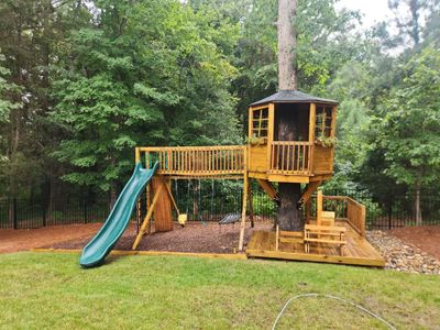Concrete Driveway, Wood Playset using Wood Sealant and Concrete Sealant