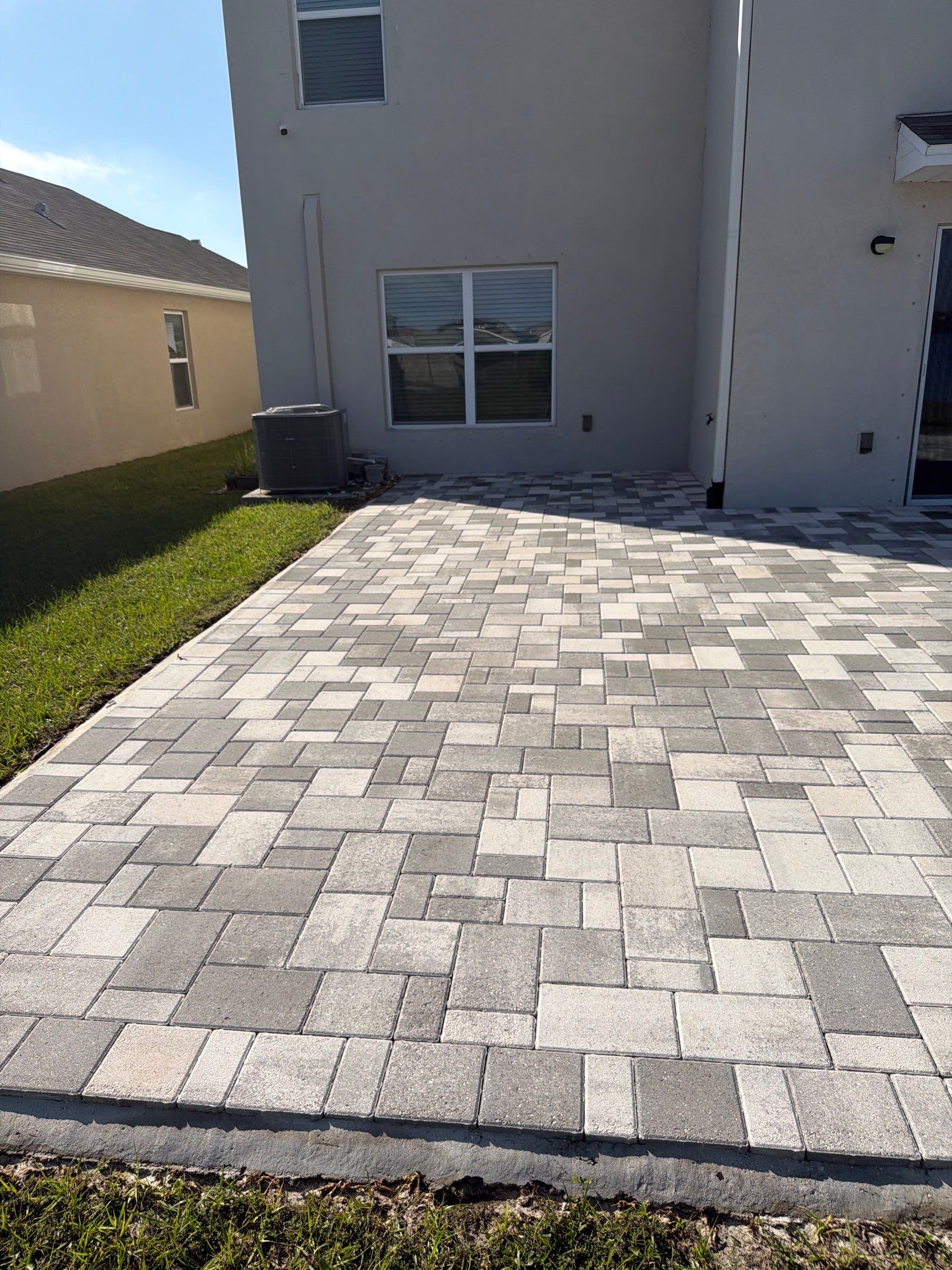 Paver Sealing and Restoration for Large Multi-Toned Patio in Wimauma by Supreme Paver Experts