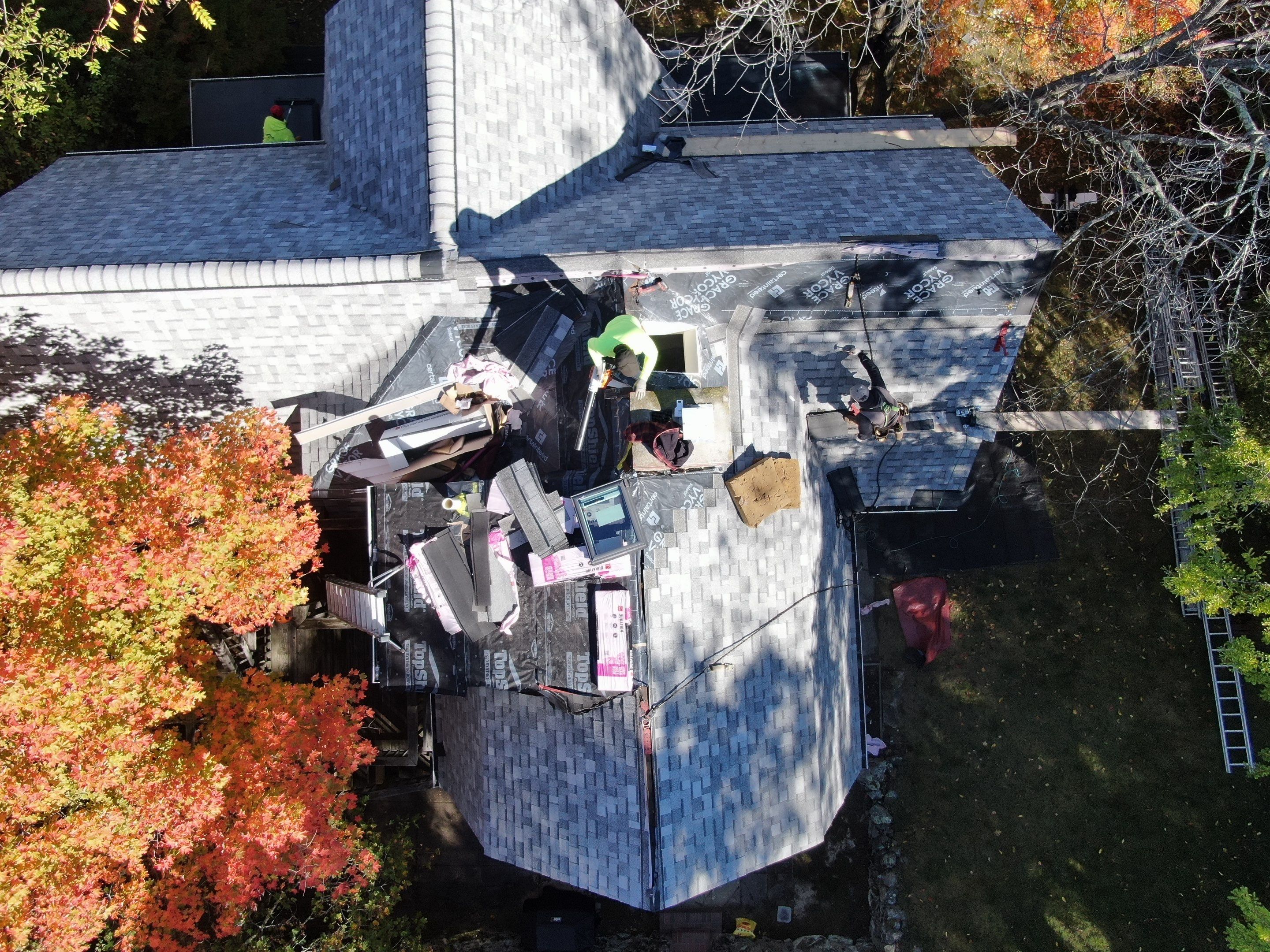 Full Roof & Porch EPDM Replacement with Skylight and Chimney Repairs by Mighty Dog Roofing of Greater Middlesex County