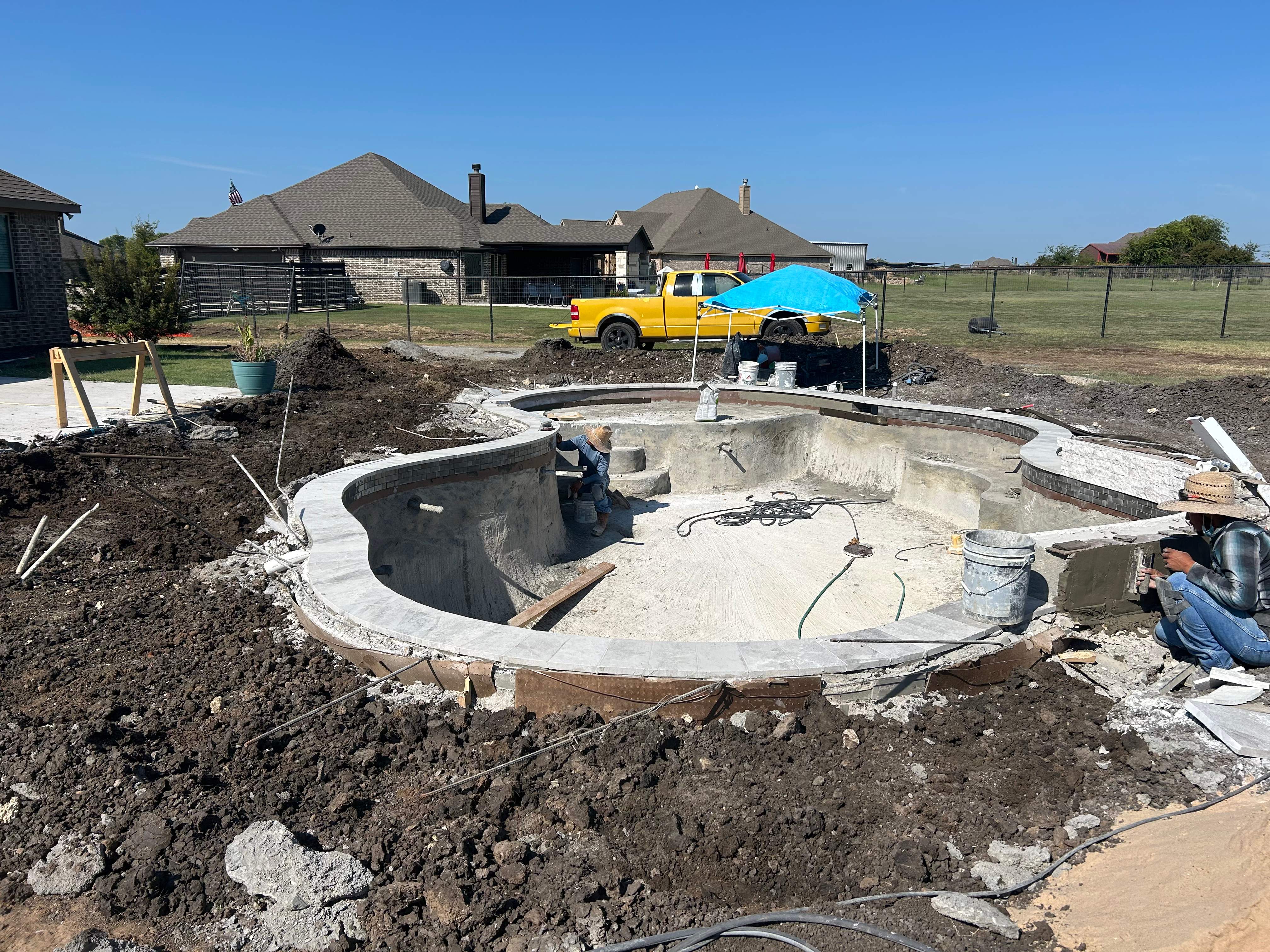 Freeform Pool with Expansive Concrete Deck by Pinnacle Pools and Spas - DFW