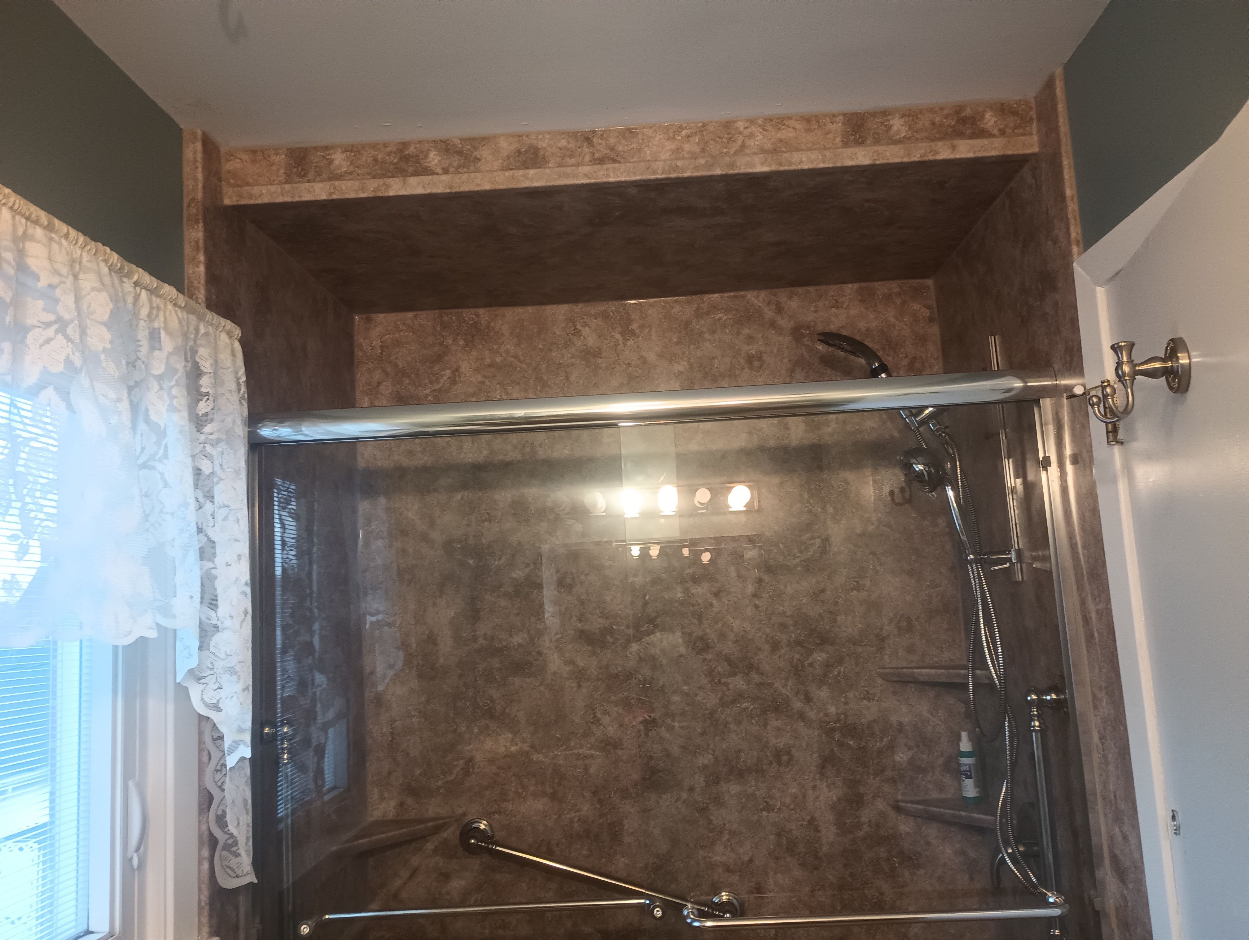 Tub to Shower Conversion using BCI Acrylic Shower System by Secure Construction Company Inc