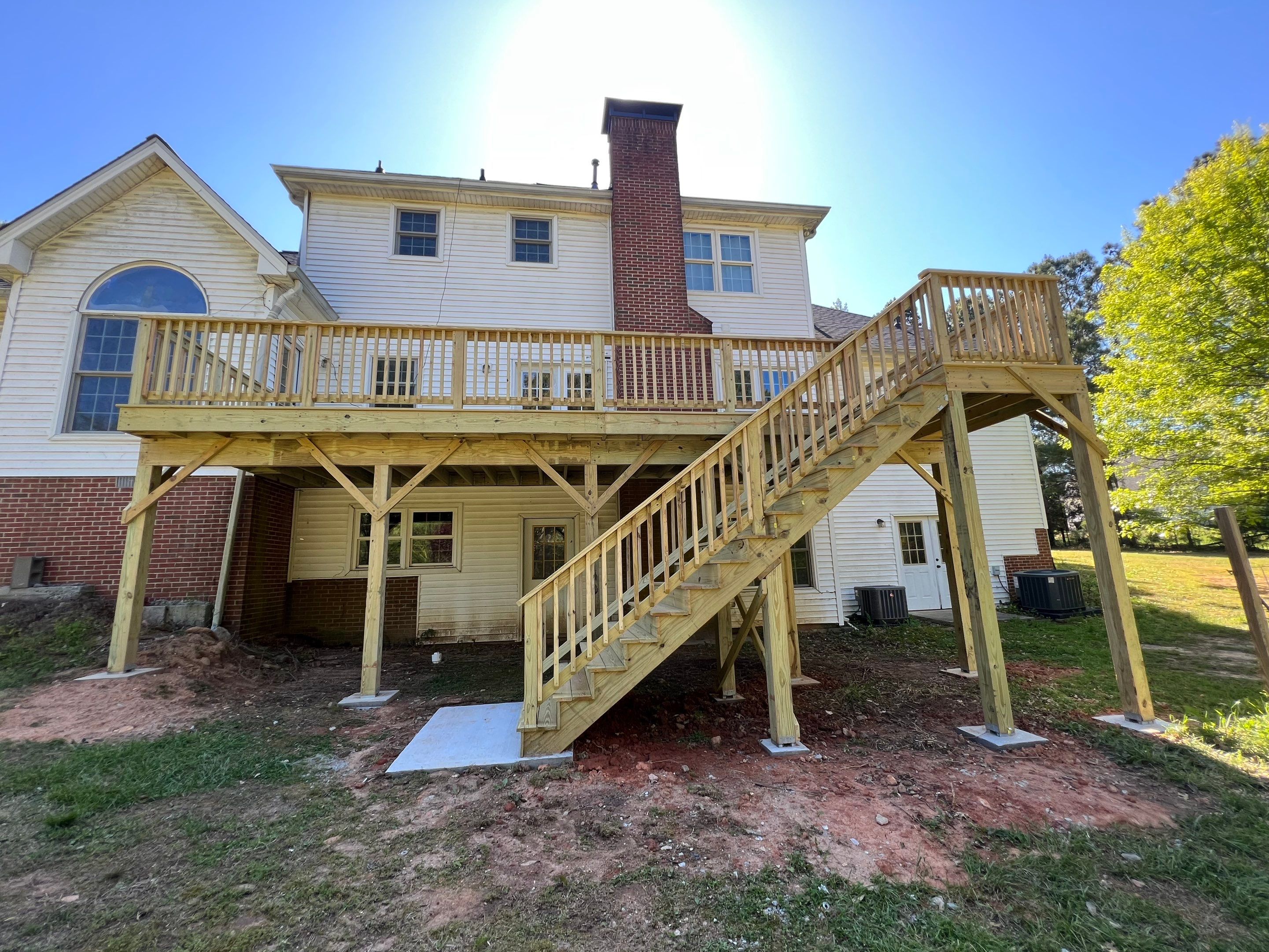 Pressure-Treated Wood Deck and Side Porch Replacement in Dacula by Swift Home Renovations