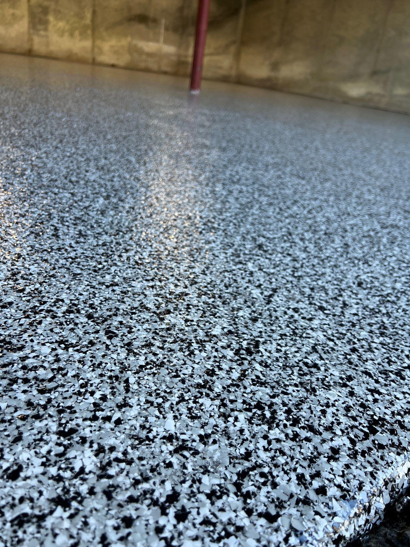 Garage in Londonderry, NH 03053 by Symphony Concrete Coatings