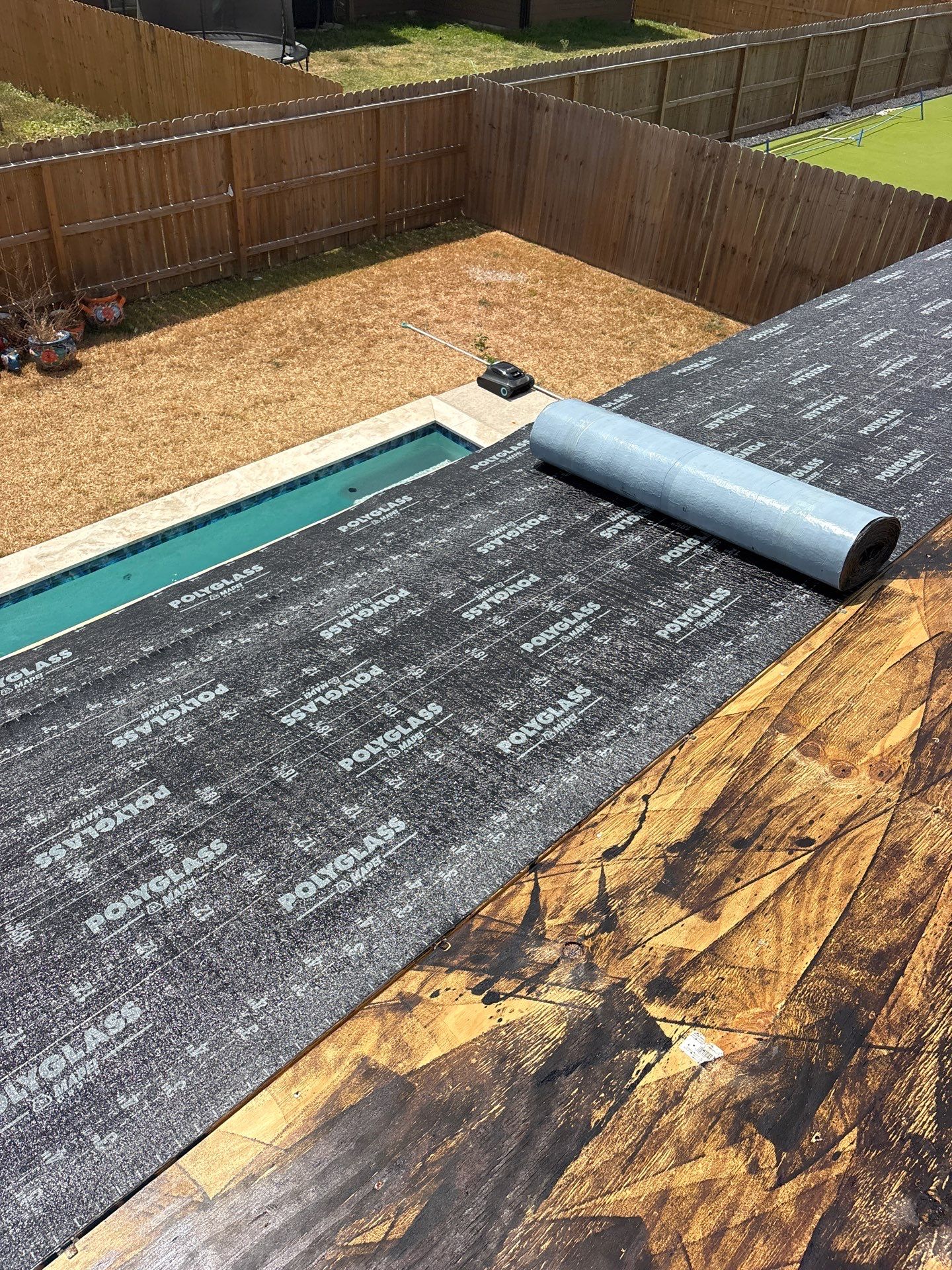 Patio Pool Cover by Bayfront Roofing and Construction