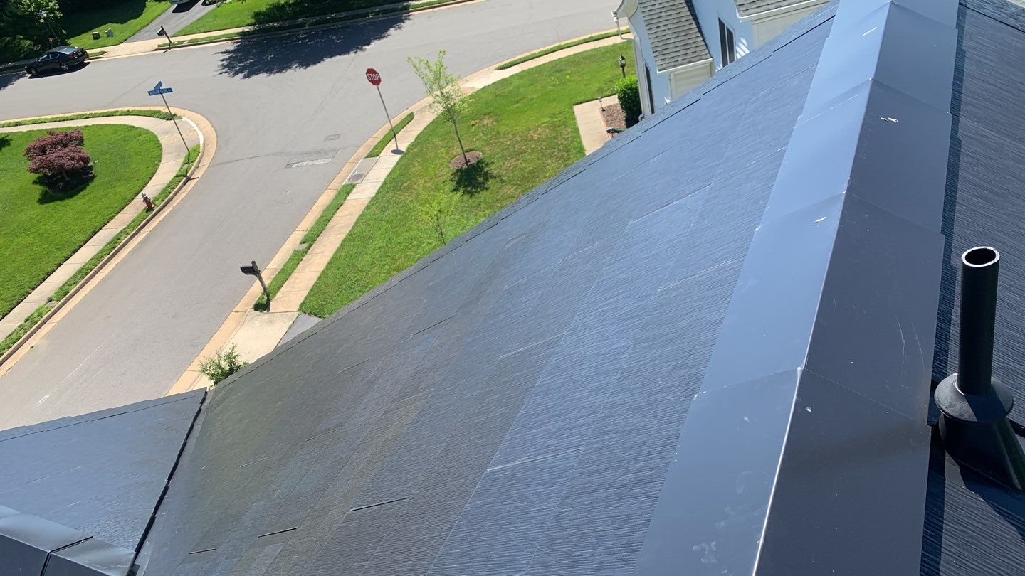 Tesla Solar Roof Replacement using Tesla Solar Roof V3 tiles by American Home Contractors