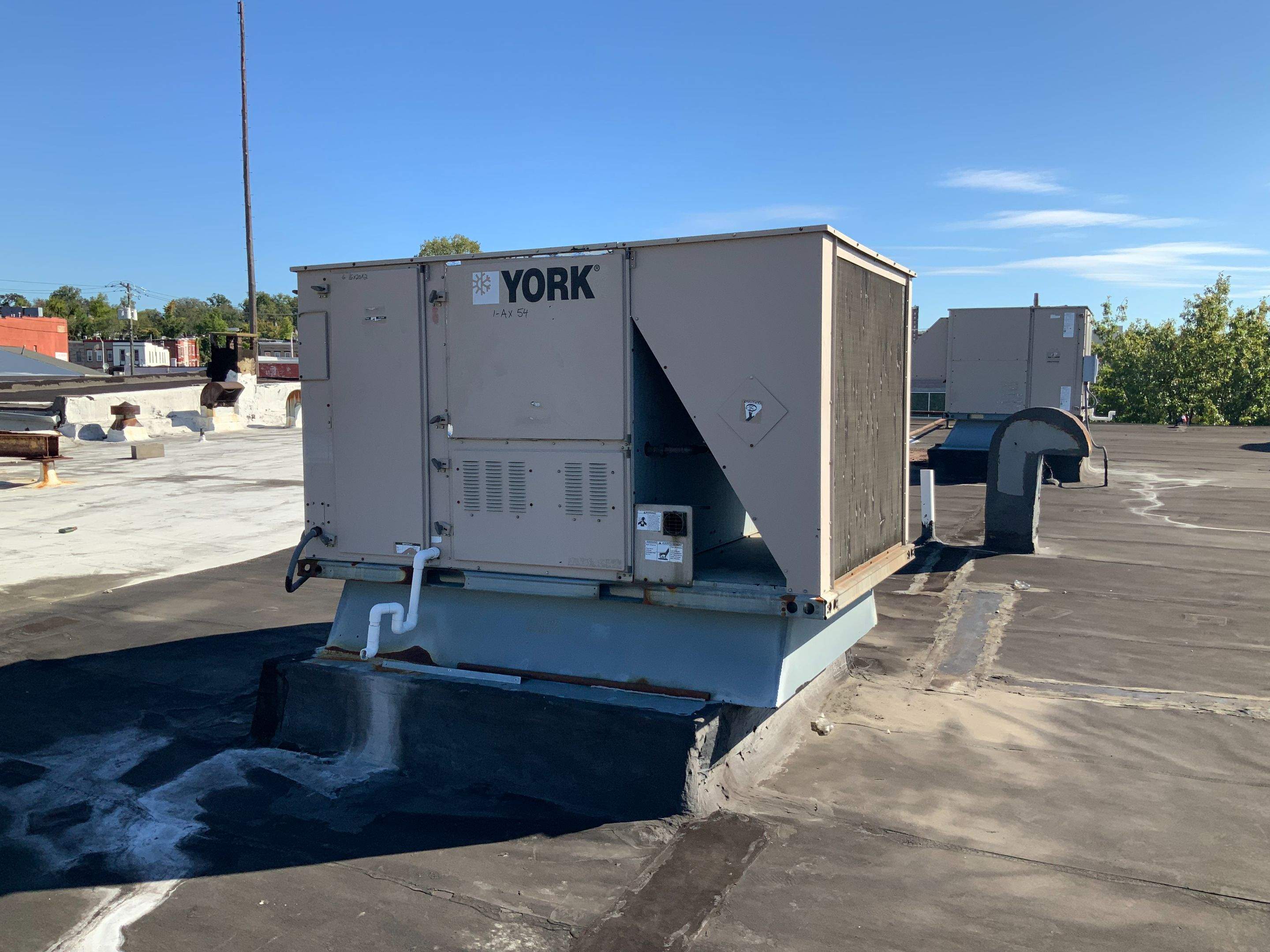 Commercial Roofing Repair using new Flashing by Alpha Design Services