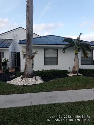 Residential Roofing Installation using 1" Nail strip metal roof