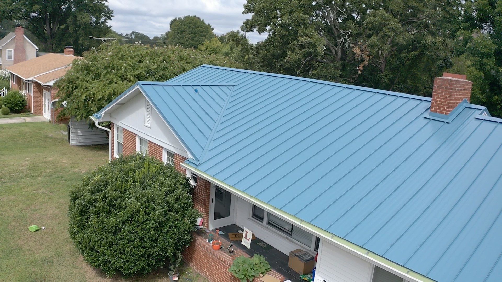 Carolina Blue Standing Seam Roof by Just In Time Roofing and Restoration