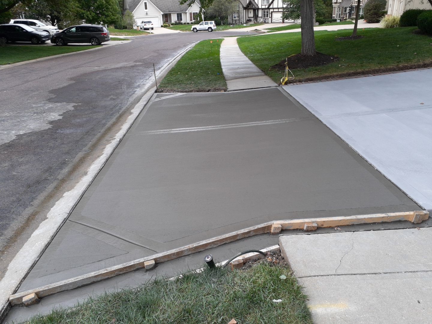 New Driveway and Sidewalk by LAND ESCAPES LLC