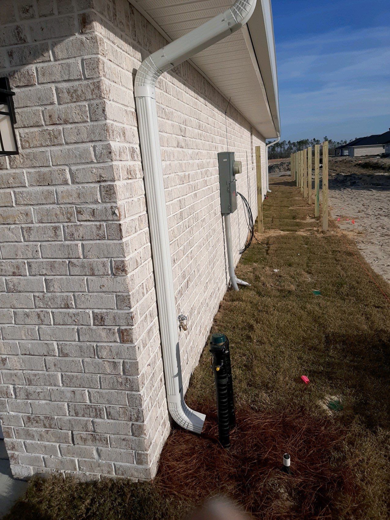 Seamless Gutter Installation Using White K-Style Gutters by Gutter Professors