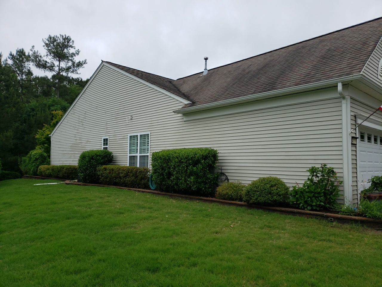 House Wash using cleaner by Power Wash Masters LLC