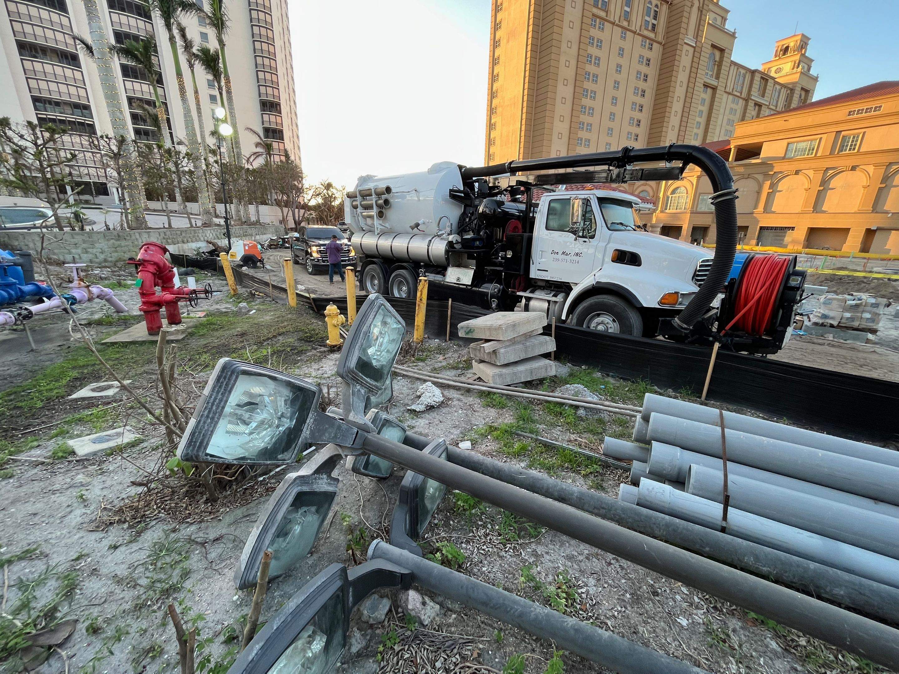 Ritz-Carlton S. Pool Deck & S. Service Rd Drain Cleaning by APS Power & Water