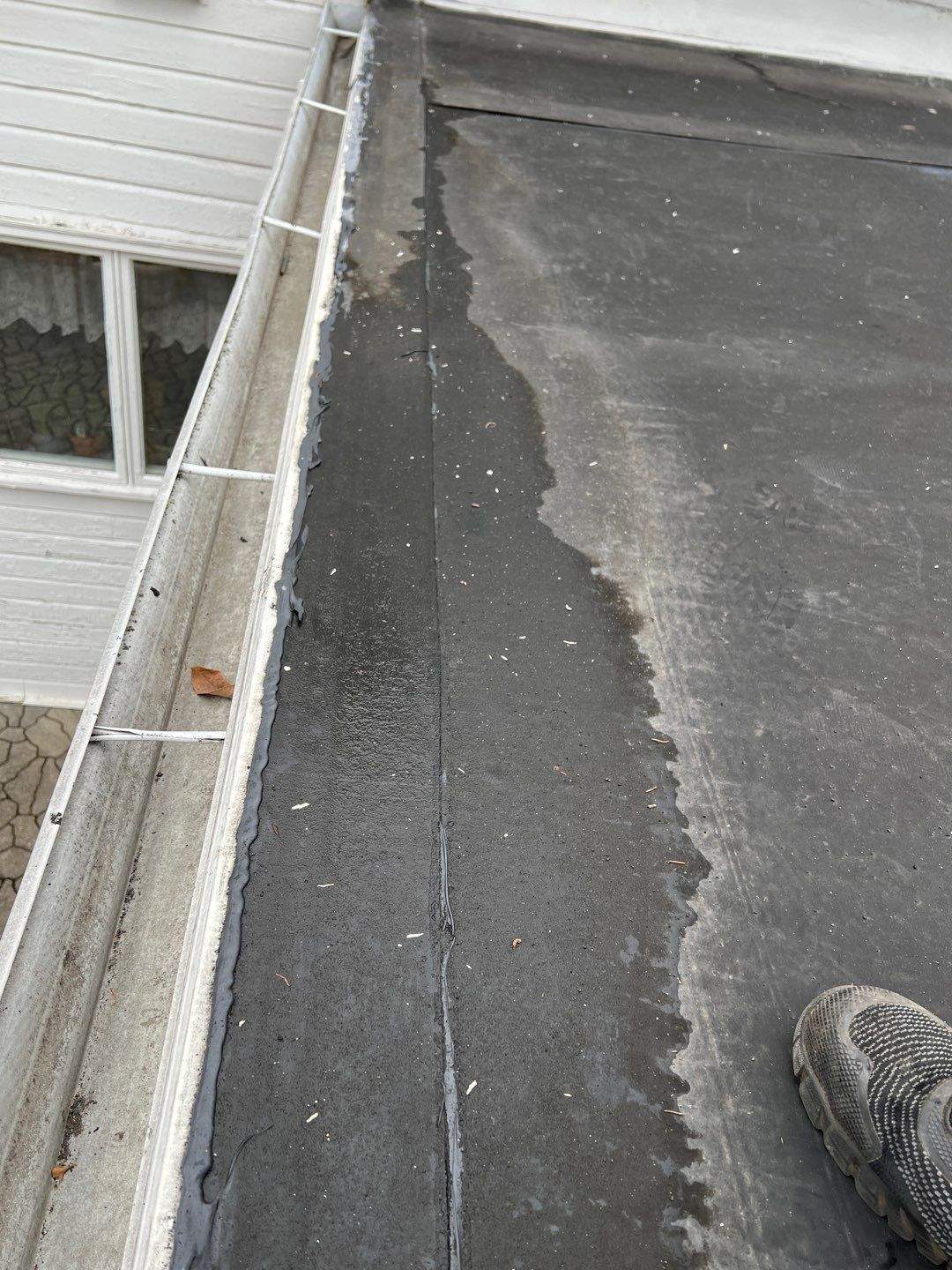 Residential Roofing Installation using 60 mil rubber roof by Nitro Roofing and Construction