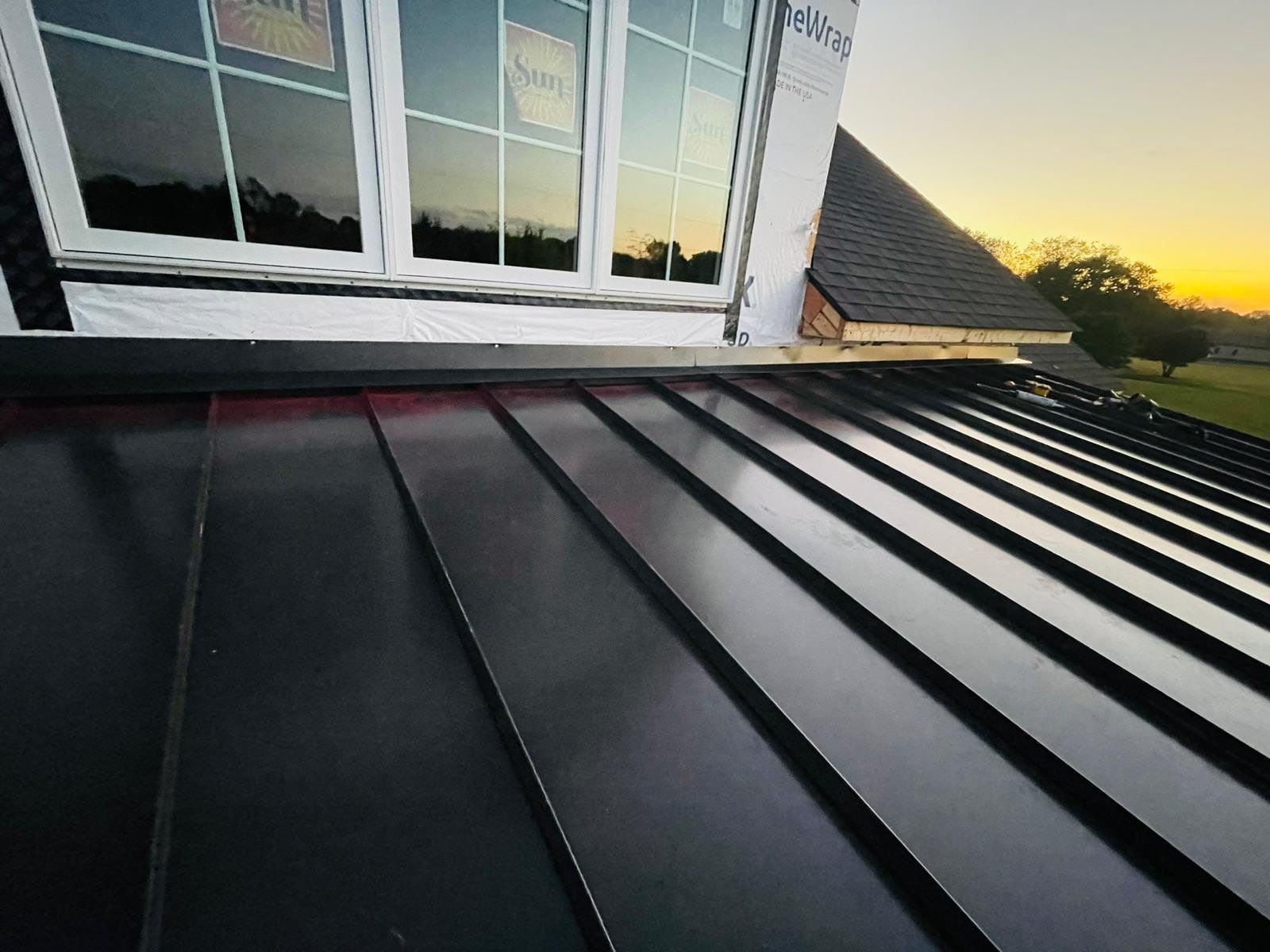 Residential Roofing Installation using Tamko Heritage AR with Standing Seam Metal Porch by Undersun Roofing 