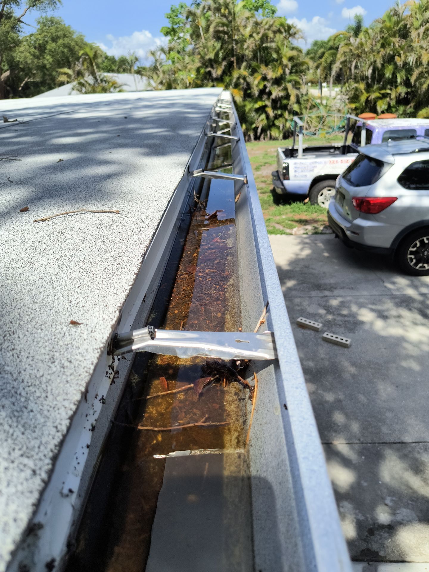 Seamless Galvalume Gutters Installation using Galvanized Gutters in Fort Myers FL by Gutter Professors