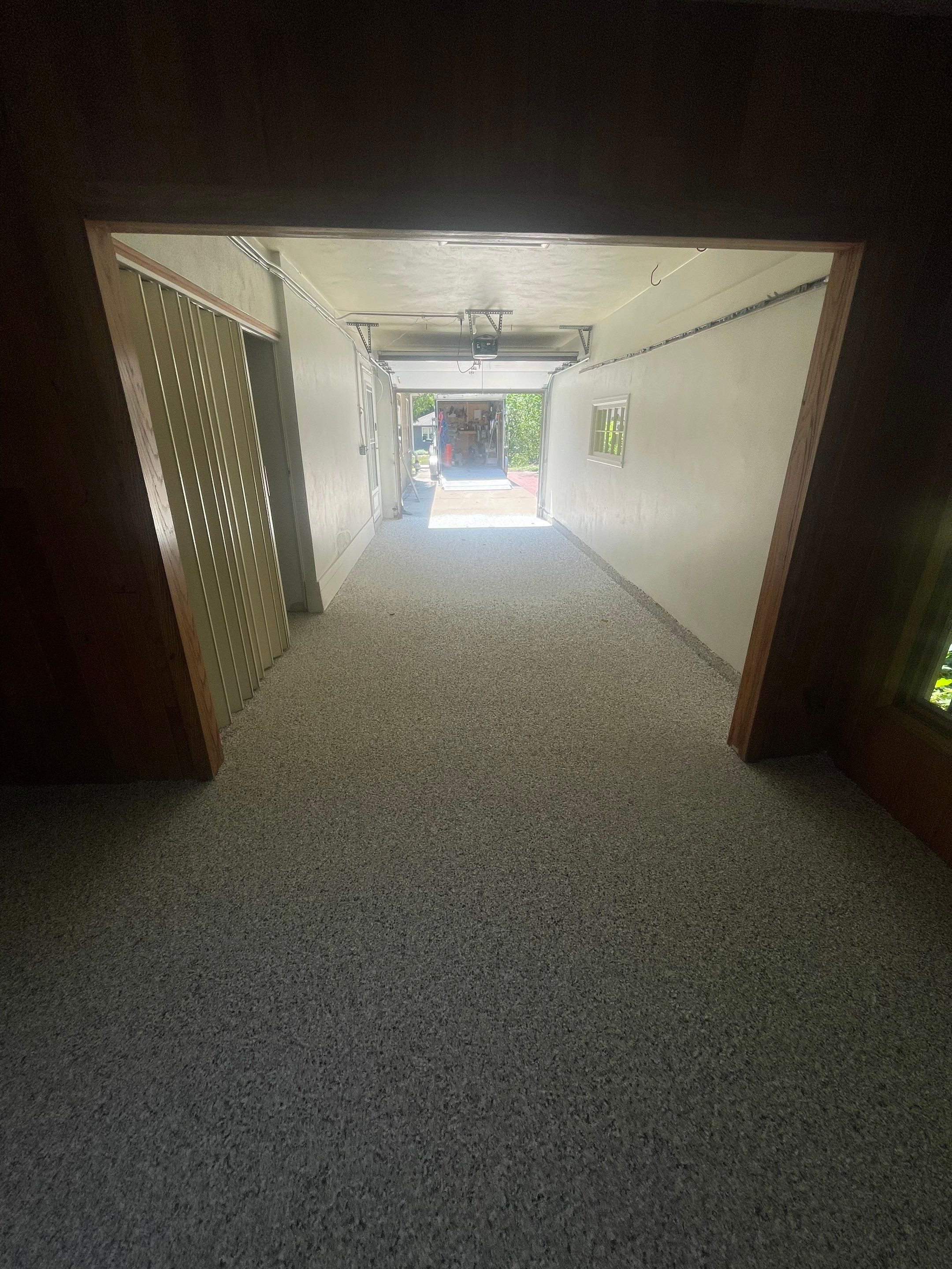 Sioux Falls Garage and Sunroom Concrete Coating with Coyote Flake by Select Painting, Coatings & Garage Cabinets