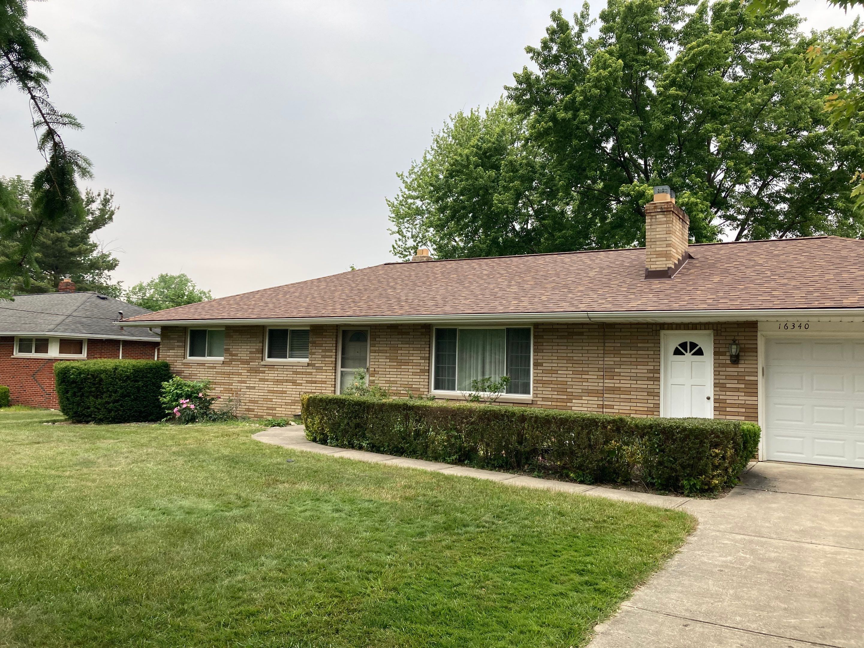 Residential Roof Replacement using Owens Corning, Desert Rose by Absolute Roofing and Construction