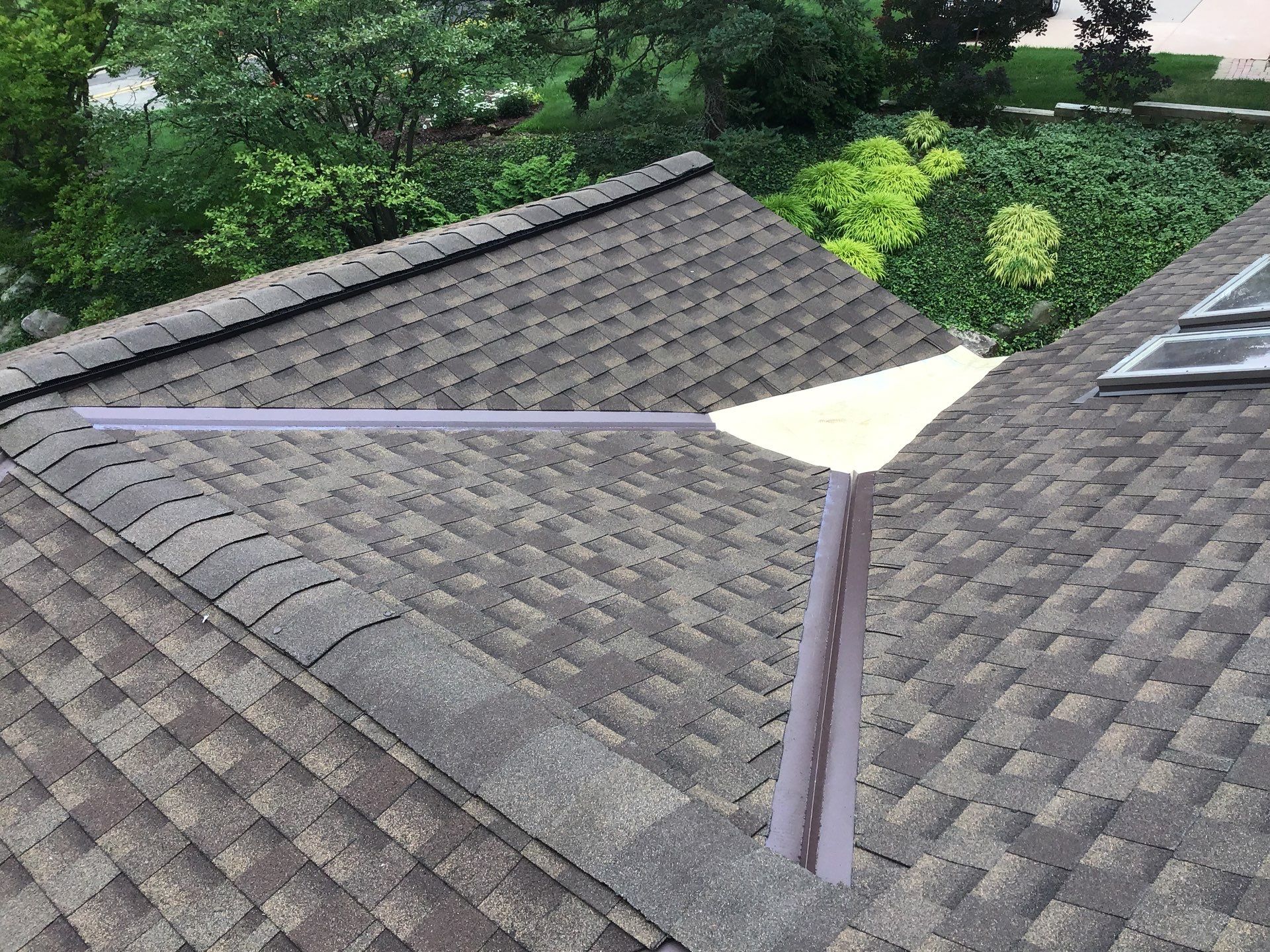 Velux Skylights, GAF Roofing, Front Porch Overhang by Northwest Construction 