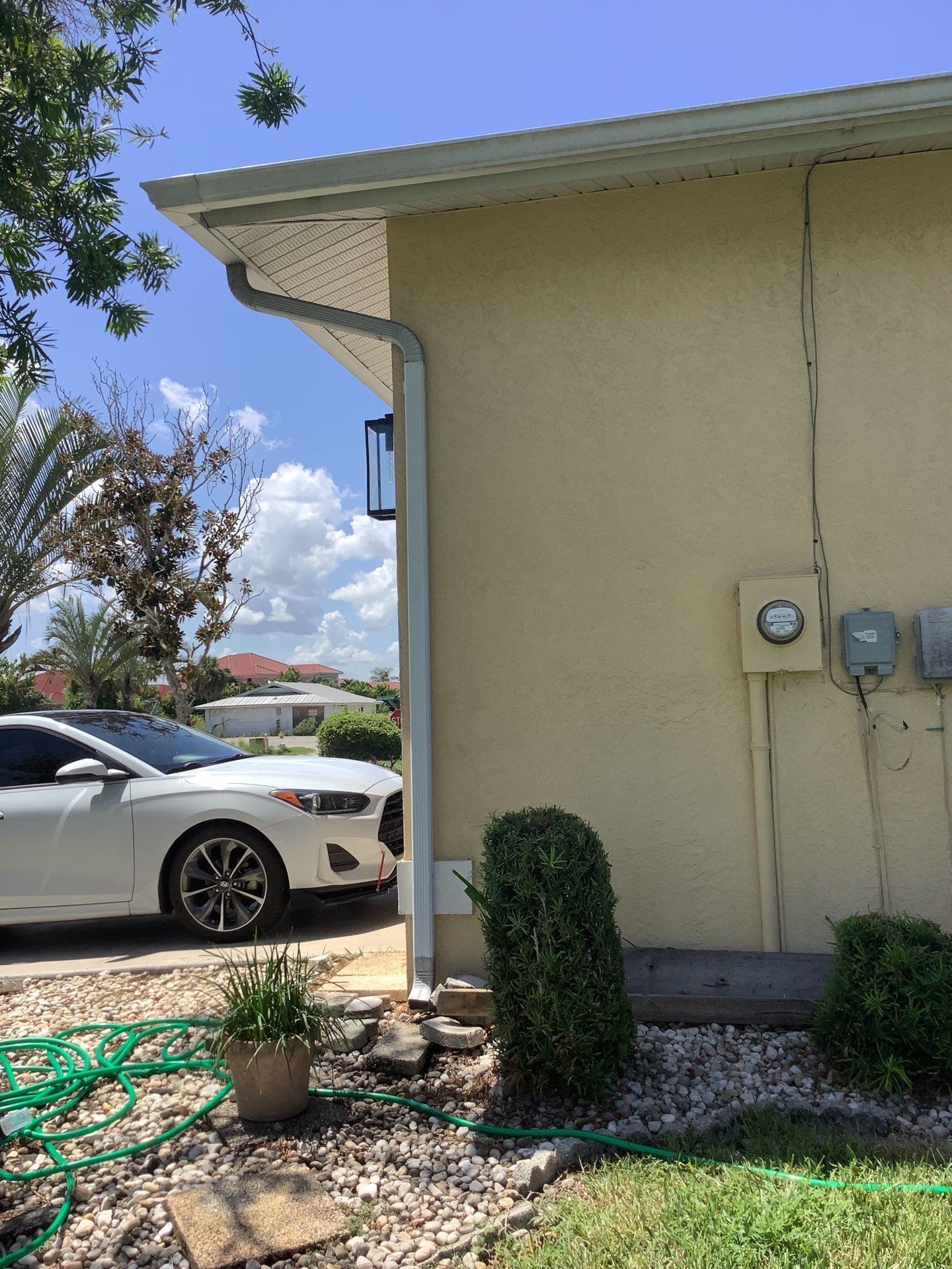 White Seamless Gutters Installation in North Fort Myers FL by Gutter Professors