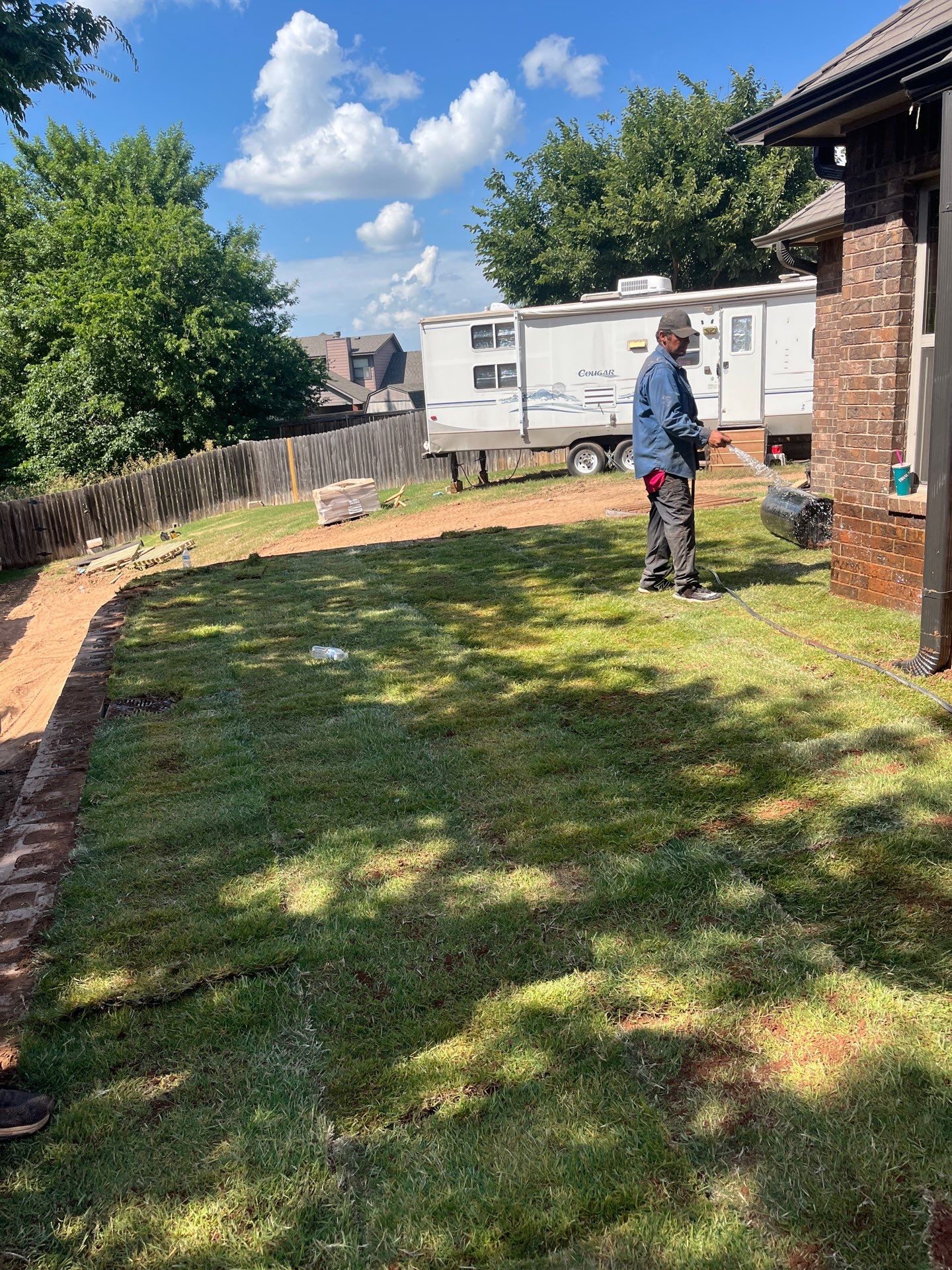 Custom Segmental Block Retaining Wall and Sod Installation in Lawton by Clays Services Inc