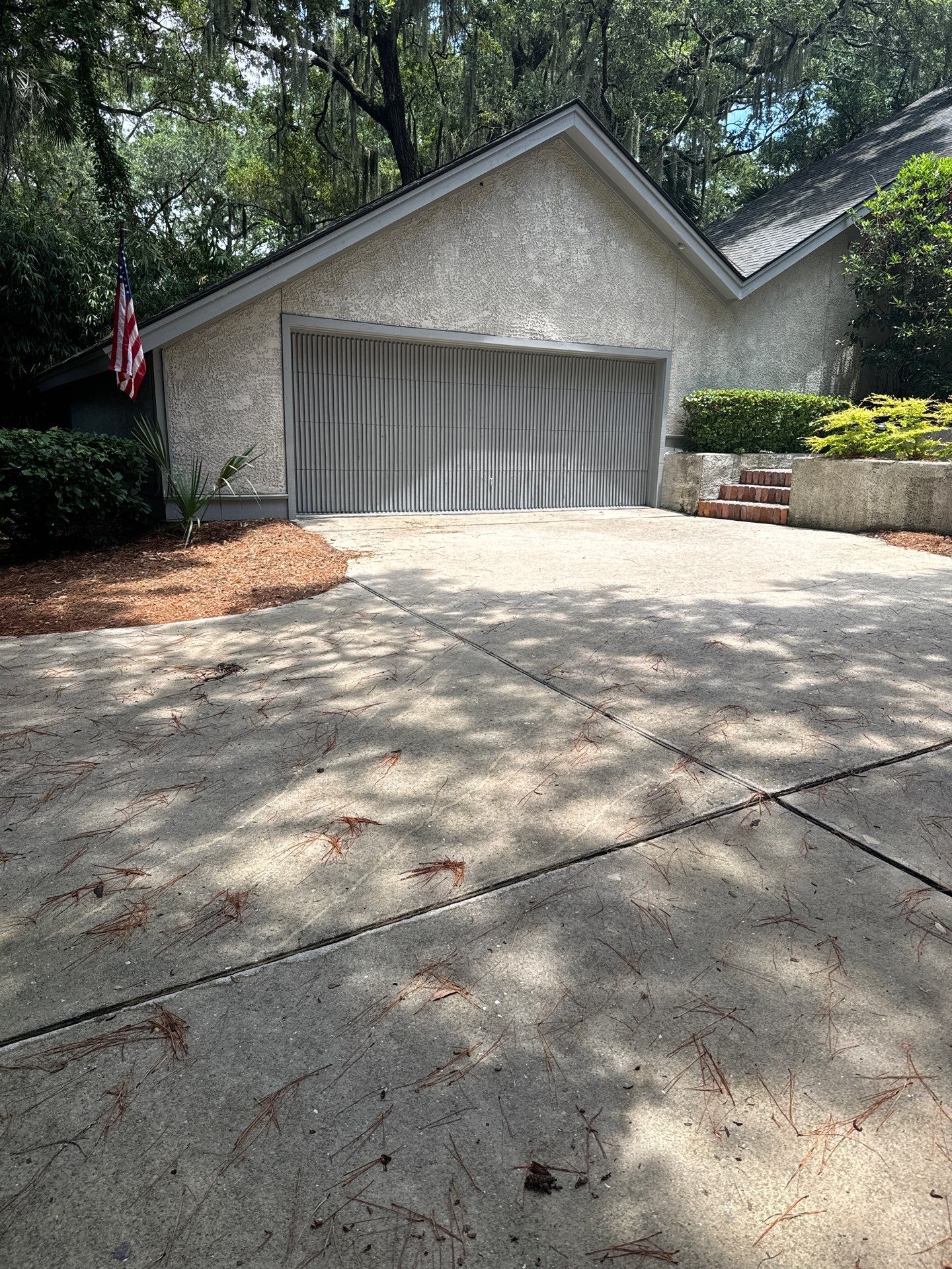 Hilton Head Island Concrete Driveway Replacement with Decorative Paver Borders by Lowcountry Scapes, LLC