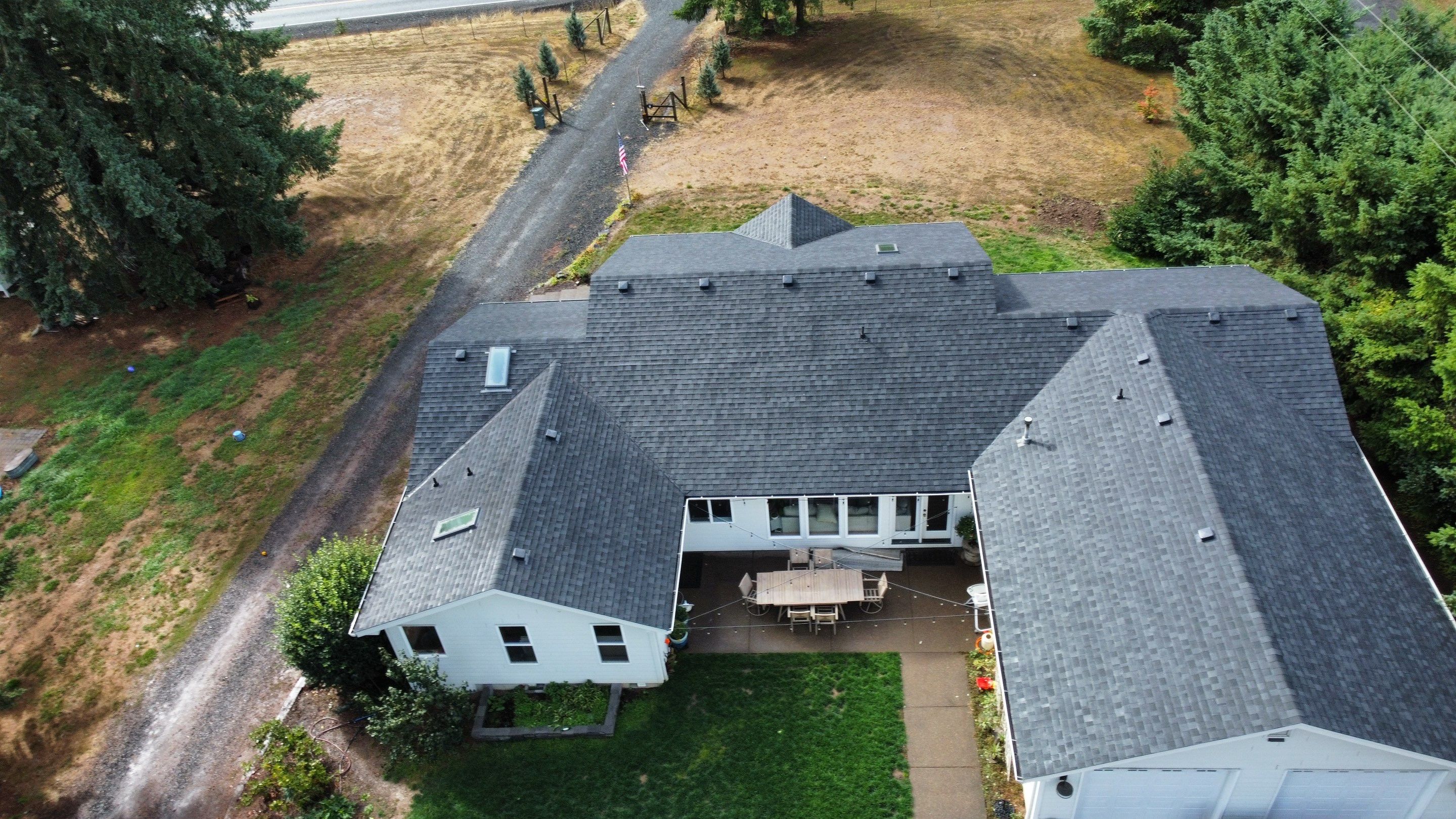 Residential Roofing Installation using IKO Dynasty (Color: Granite Black) by Orezona Building & Roofing Company, Inc.