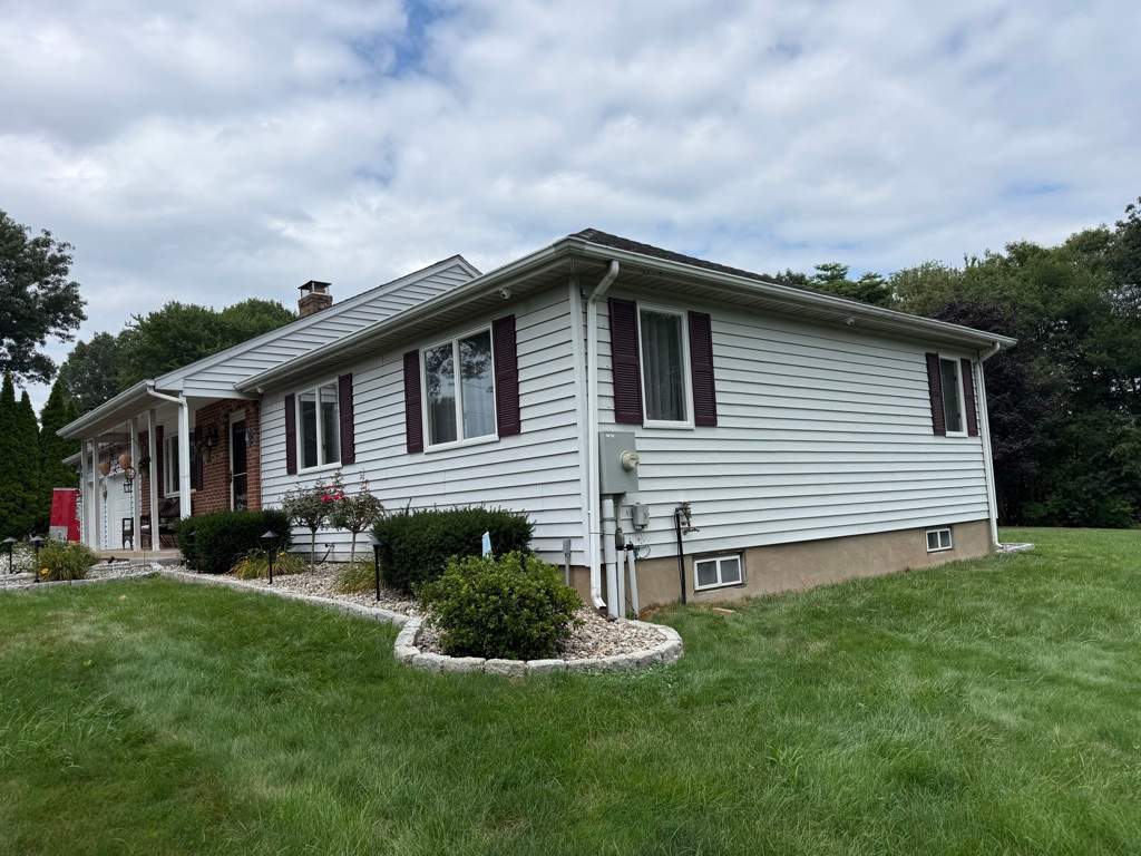 Refreshed Siding with Cert Monogram D/4 x 16'8" clapboard Charcoal Gray & Cert Monogram D/4 x 25' clapboard Charcoal Gray by DiGiorgi Roofing and Siding Inc