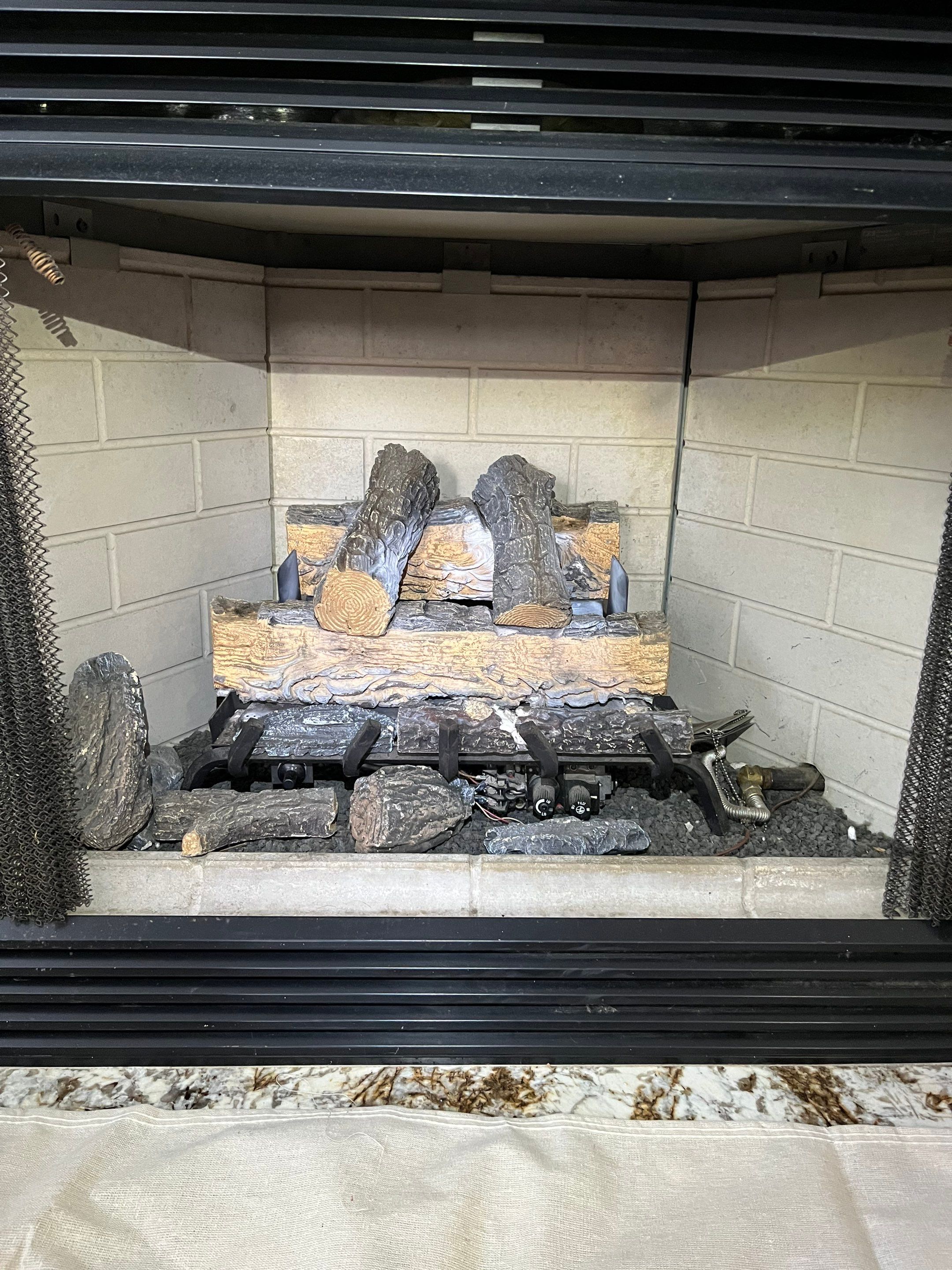 Gas Log Installation in Hampton by Premier Chimney and Roofing