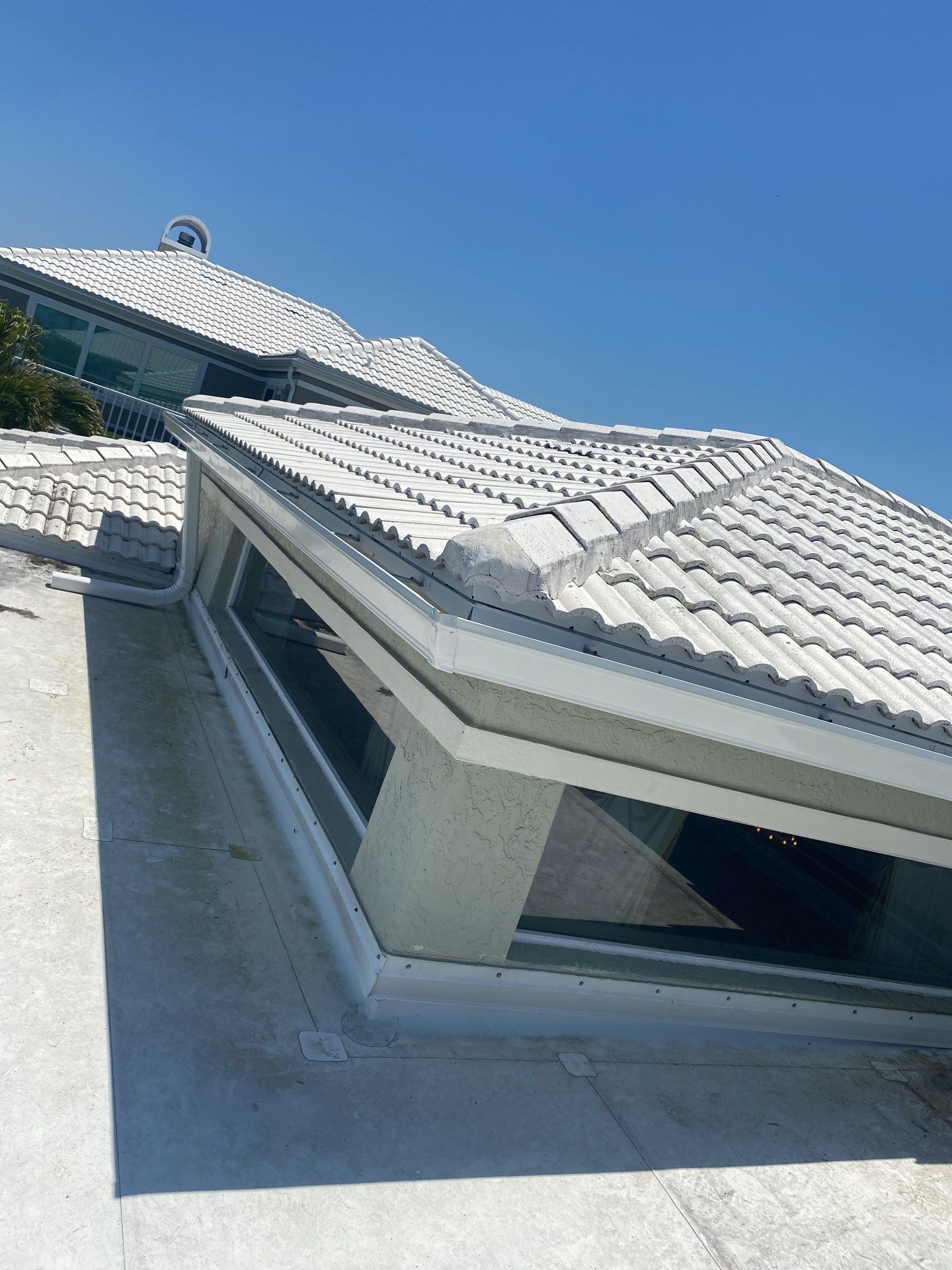 Splash Guard Gutters for Coastal Homes in Longboat Key FL by Gutter Professors