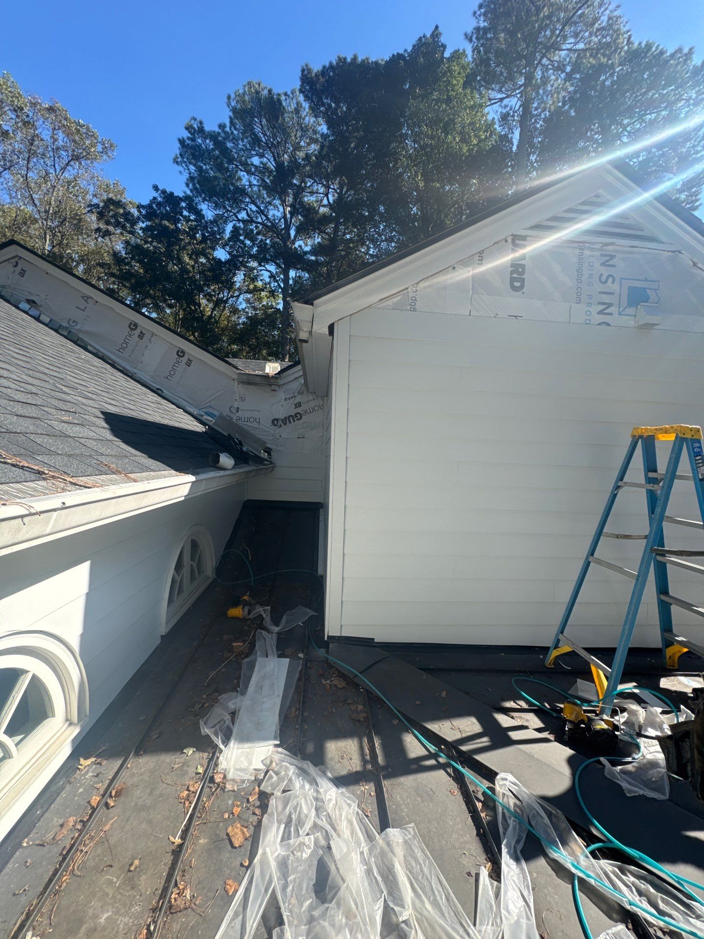 Siding Installation using James Hardie Color Plus Lap Siding by Nelson Exteriors 