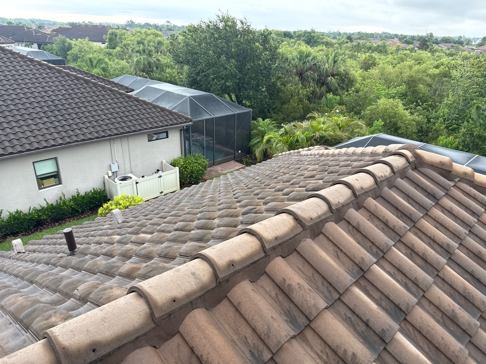 Concrete Tile Roof, Paver Driveway & Lanai Cleaning – Artisan Lakes Esplanade, Palmetto, FL by Sunshine AquaWash