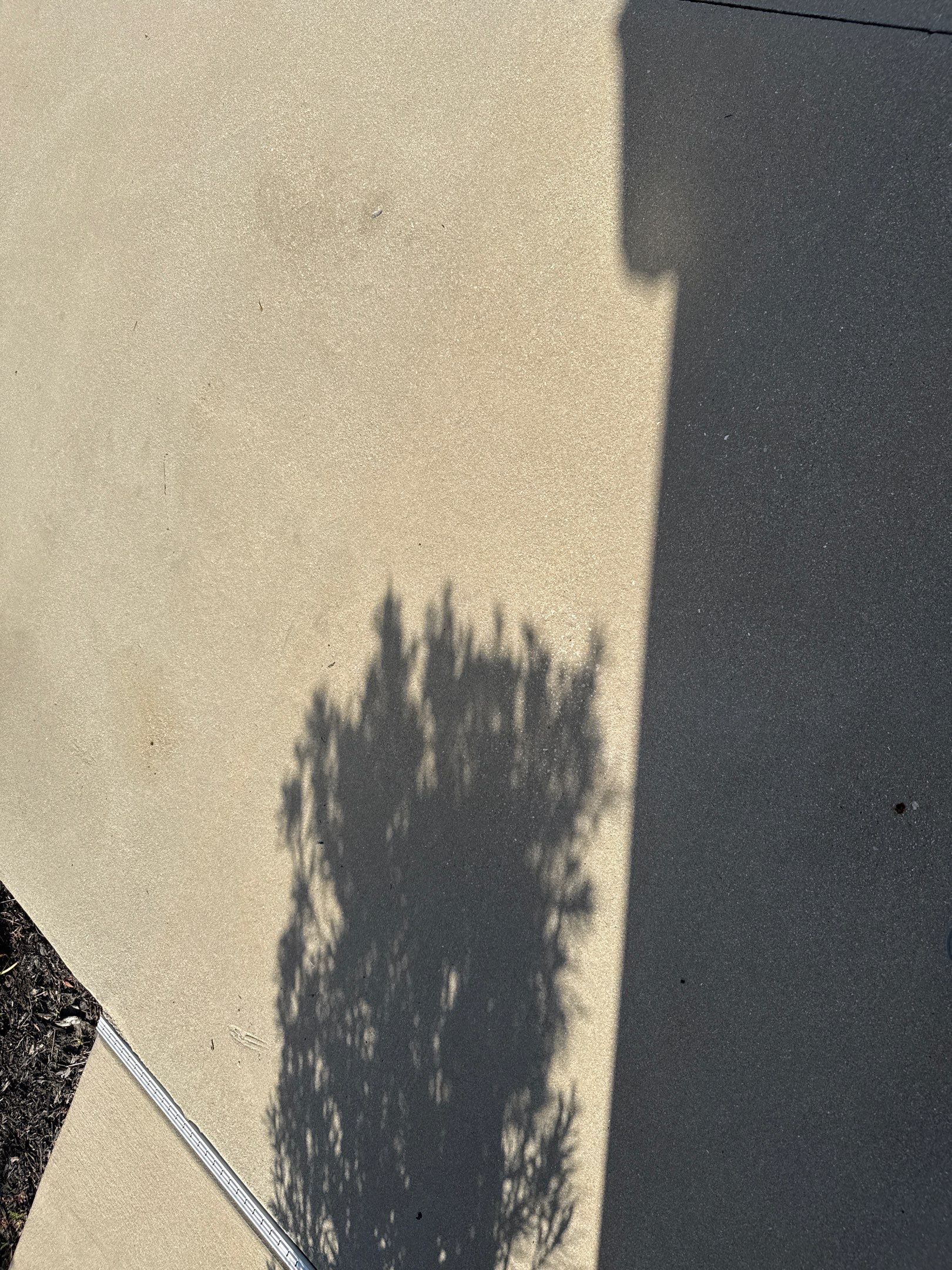 Oil Stain Removal & Concrete Cleaning – The Heights Community, Bradenton, FL by Sunshine AquaWash