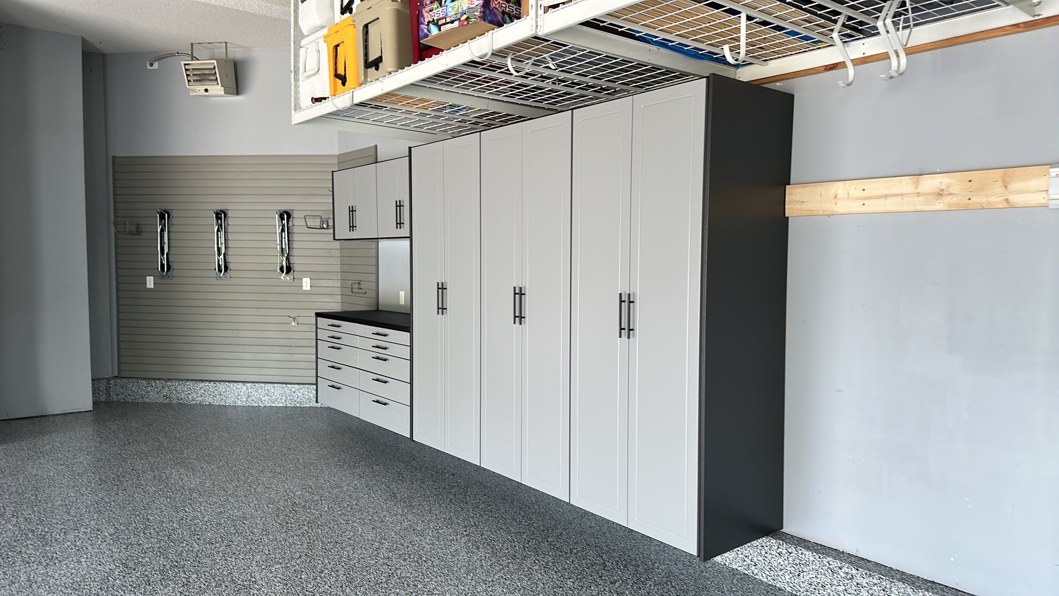 Matt N. took his garage to the next level with our Domino floor and cabinets by Banner Garage