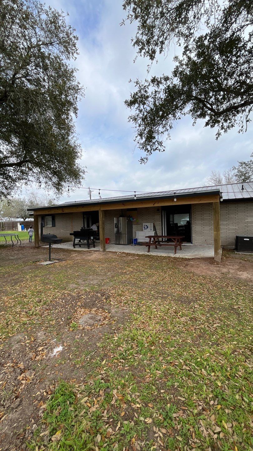 Beeville Backporch sittin' by Bayfront Roofing and Construction