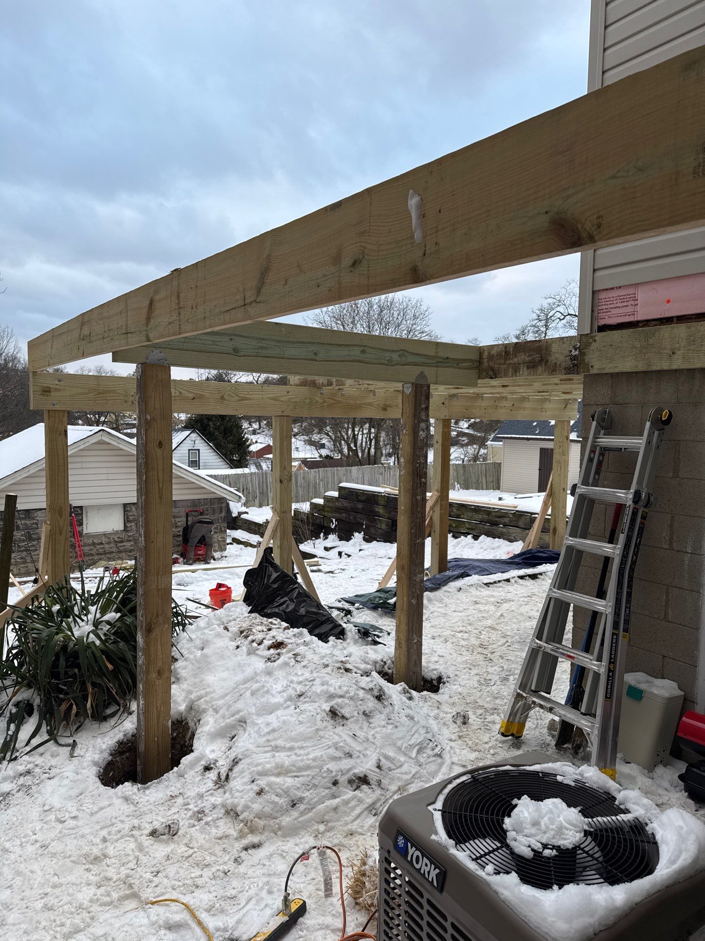 Deck and door by Cousins Roofing Siding & Decks