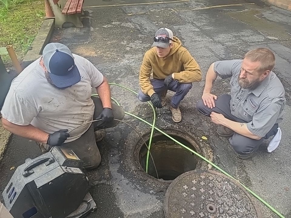 Sewer Repair using Perma-Liner through two manholes by Sureway Comfort John Wilcox Plumbing Heating Cooling