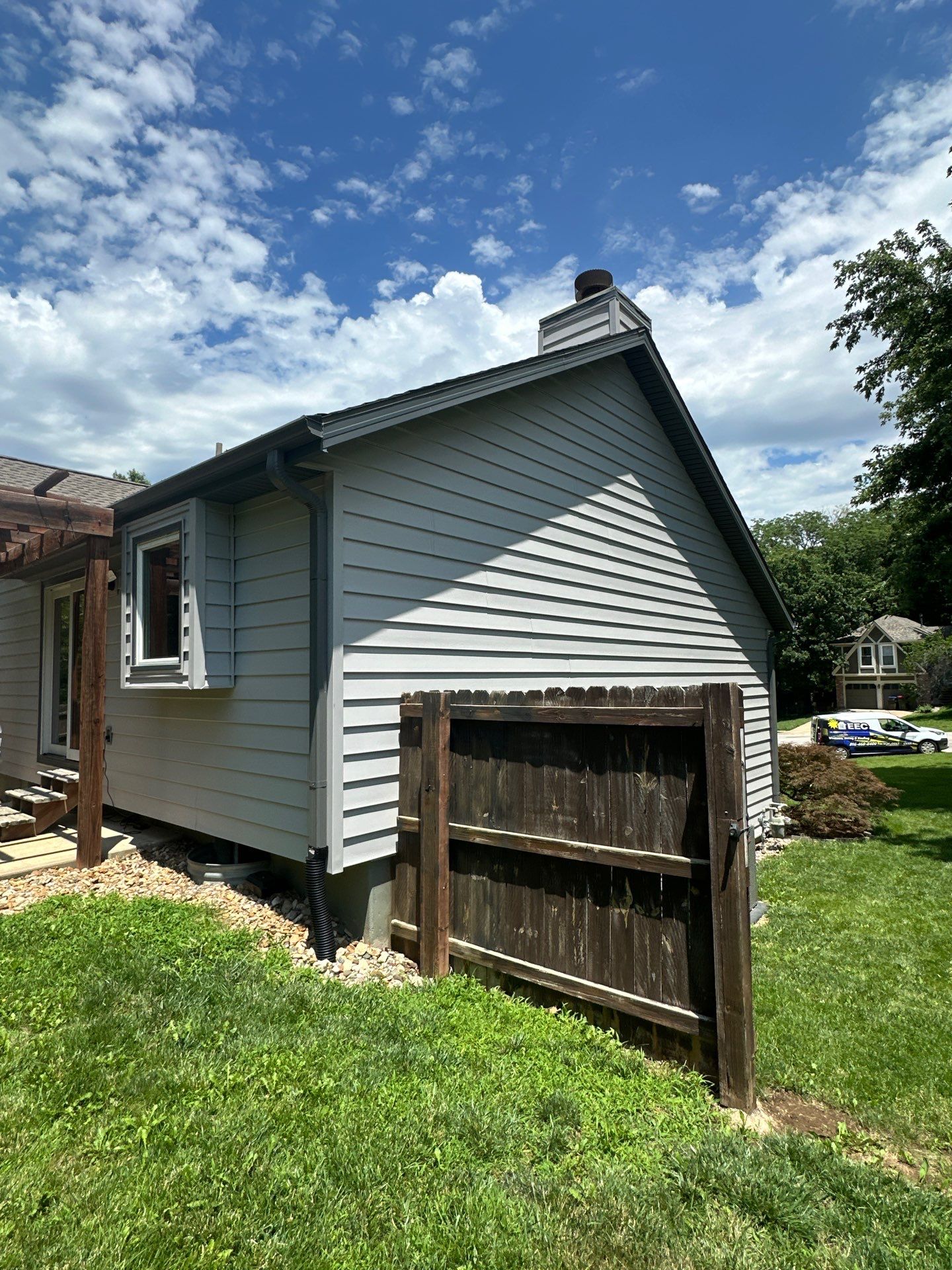 Whole-Home Craneboard Siding Replacement and Exterior Renovation in Shawnee by EEC Windows, Siding & Roofing