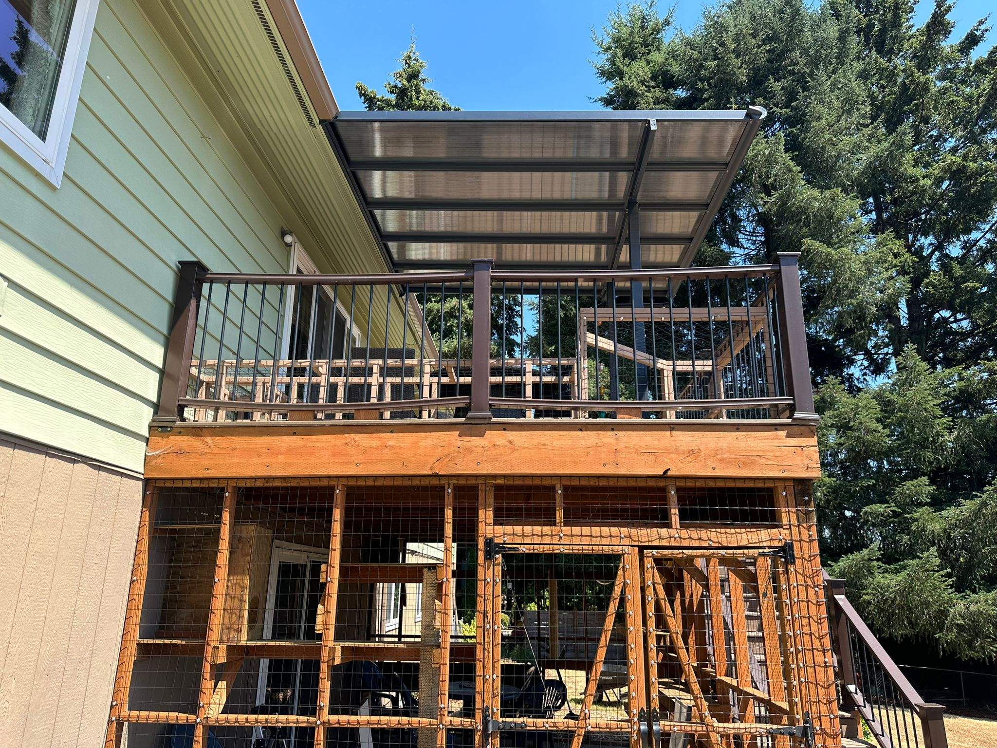 Tigard Exterior Renovation Featuring Composite Deck and Custom Catio by American Made Construction