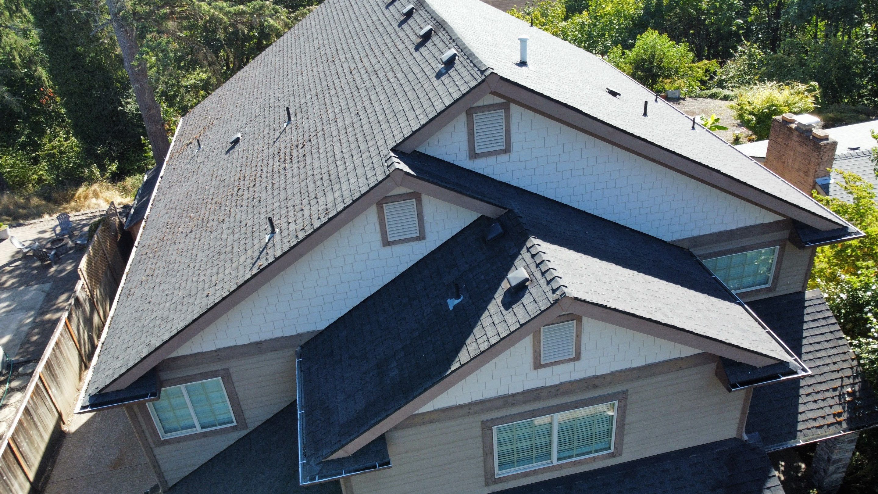 Residential Roofing Installation using Malarkey Vista AR Shingles (Color: Storm Grey) by Orezona Building & Roofing Company, Inc.