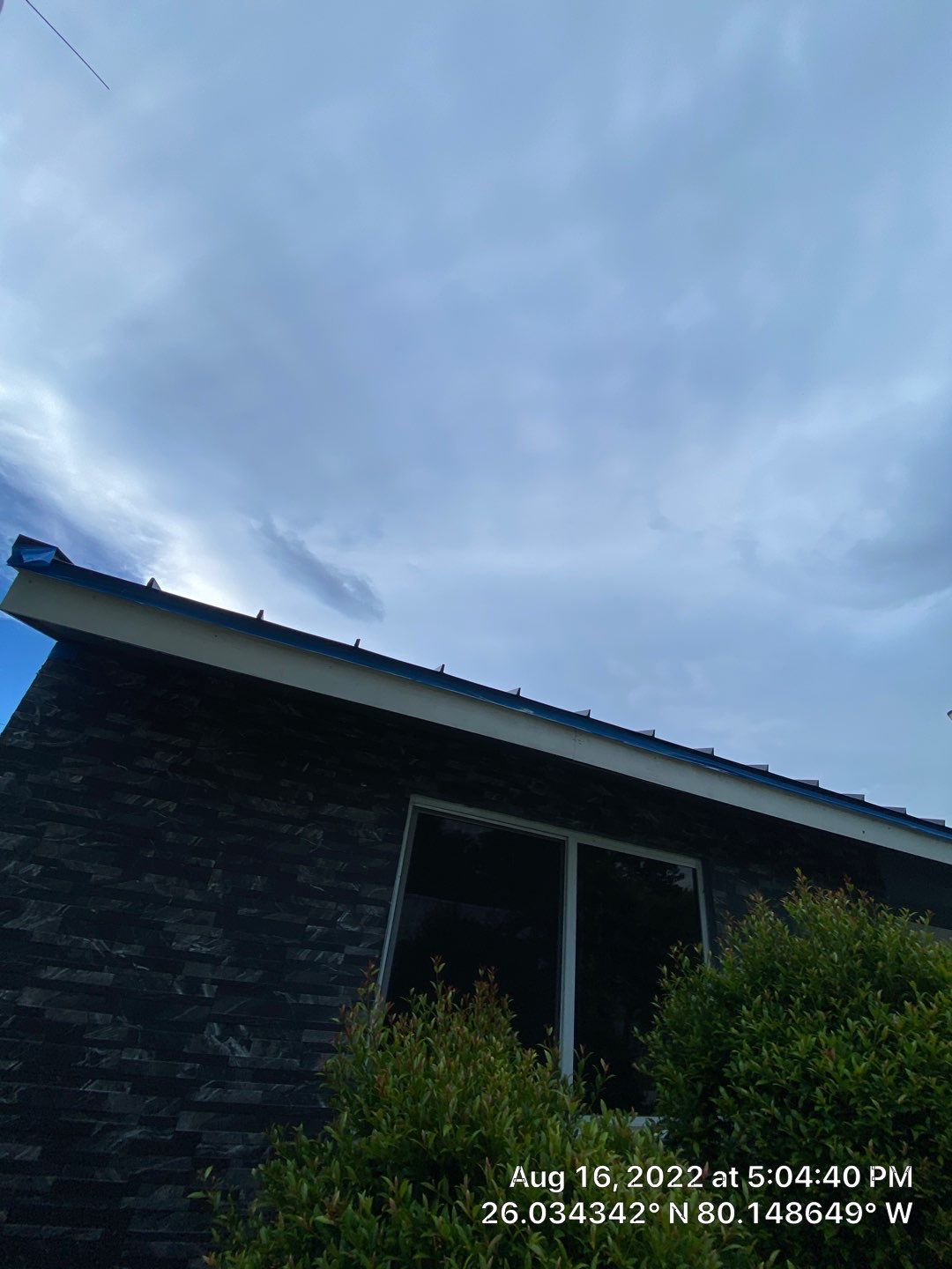 Standing Seam Metal & Flat Re-Roof using 1.5" Nail Strip 24ga Black Matte Kynar Coated Standing Seam Metal Panels by Morton Roofing, Inc.