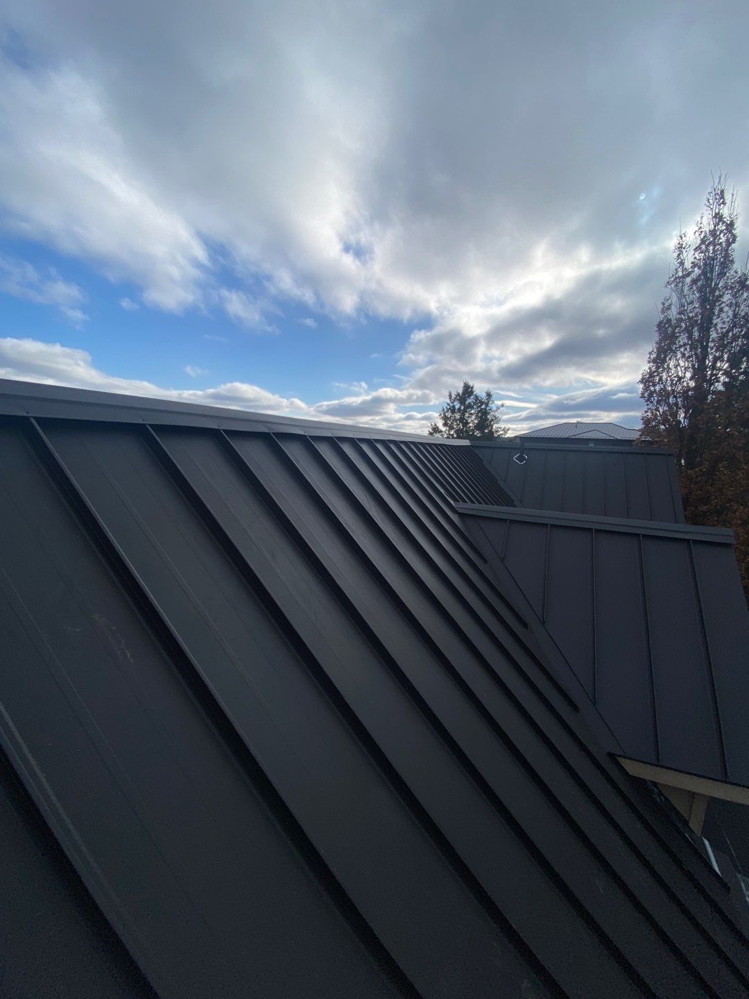 Residential Roofing Installation using 24 Ga Standing Seam Metal by Jay Carter Roofing & Sheet Metal