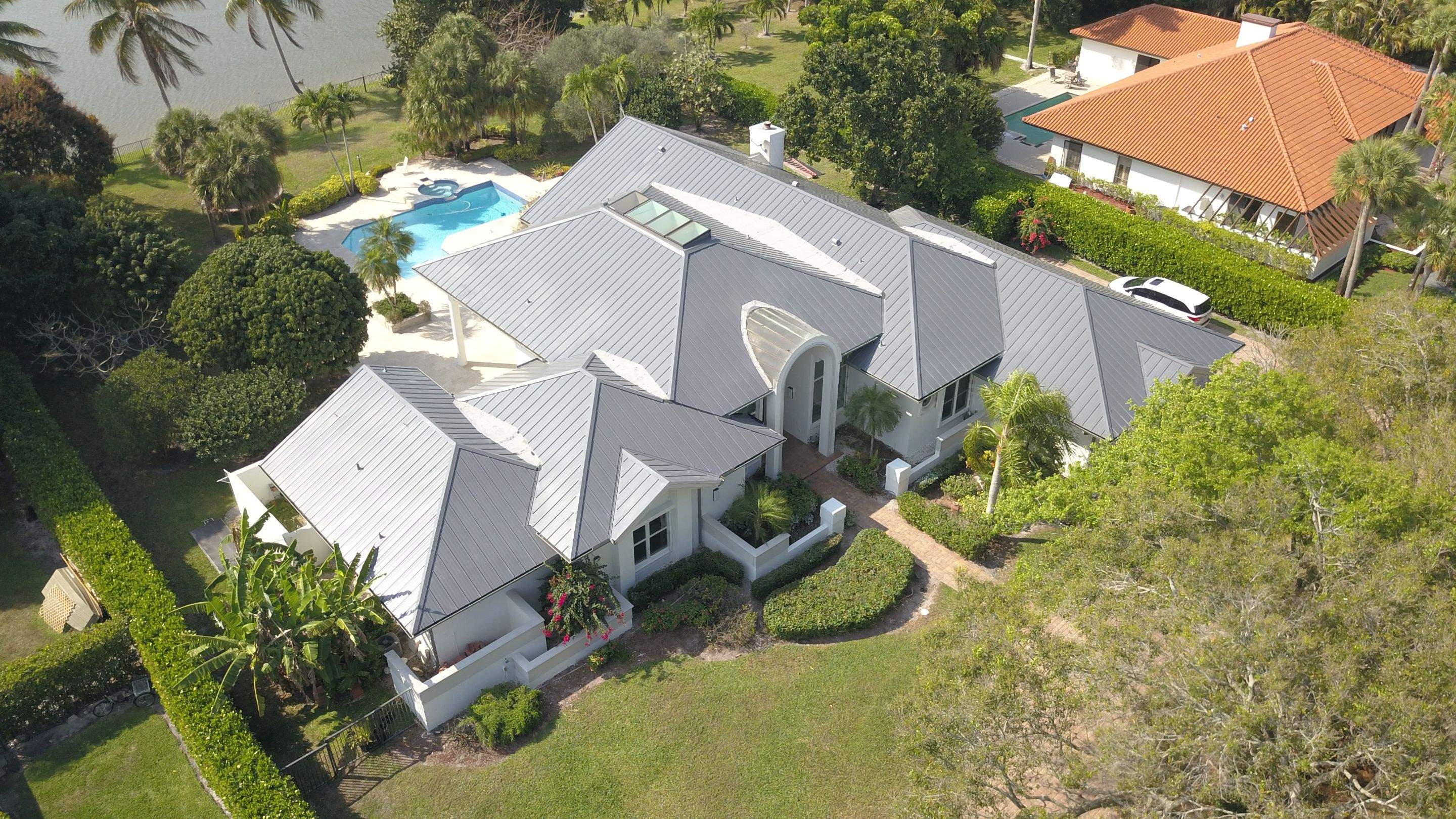 Residential Roofing Installation using 1" Nail strip metal roof by BLUES BROTHERS ROOFING