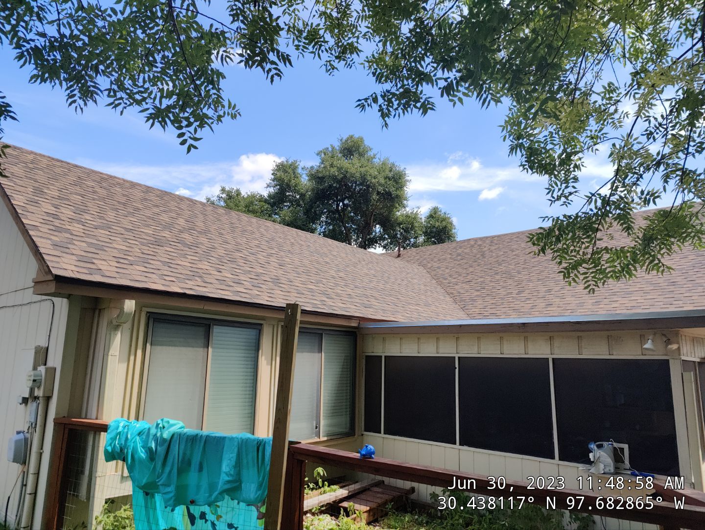 New Roof Installation Of IKO Dynasty Color Brownstone by DeZign Roofing & Exteriors