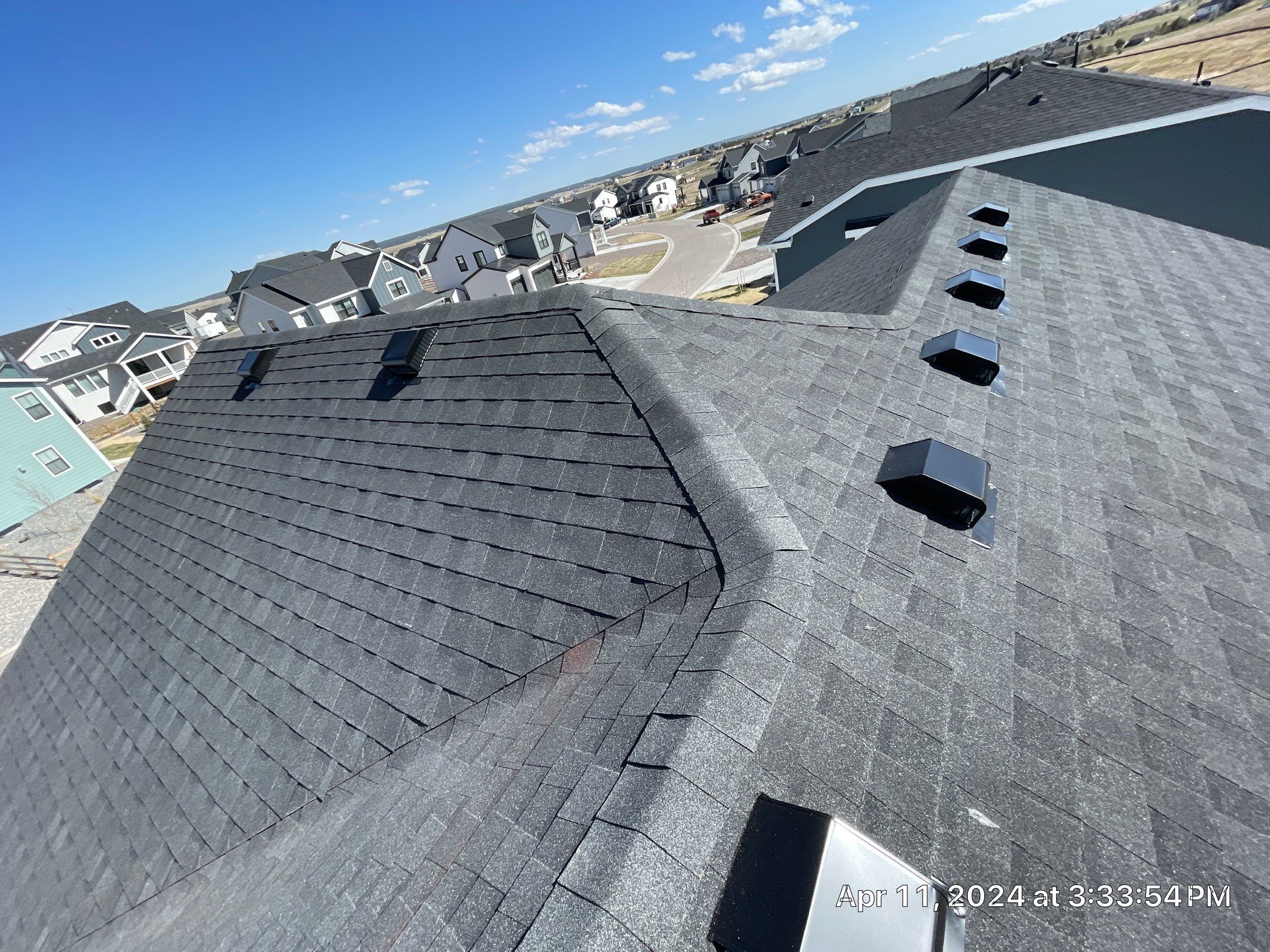 Residential Roofing Installation using Atlas Pinnacle Impact Black Shadow by Blue Peaks Roofing LLC 