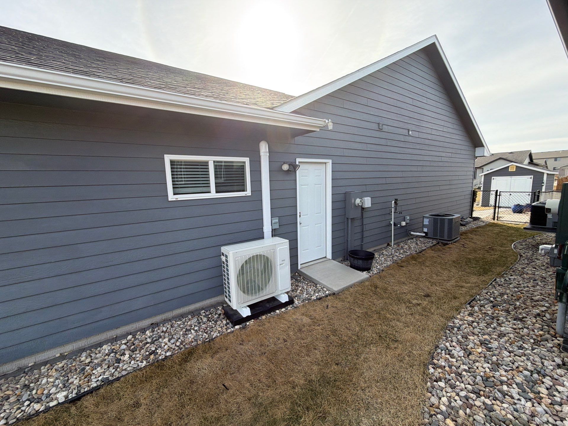 Residential Exterior Painting and Siding Refresh in Sioux Falls by Select Painting, Coatings & Garage Cabinets