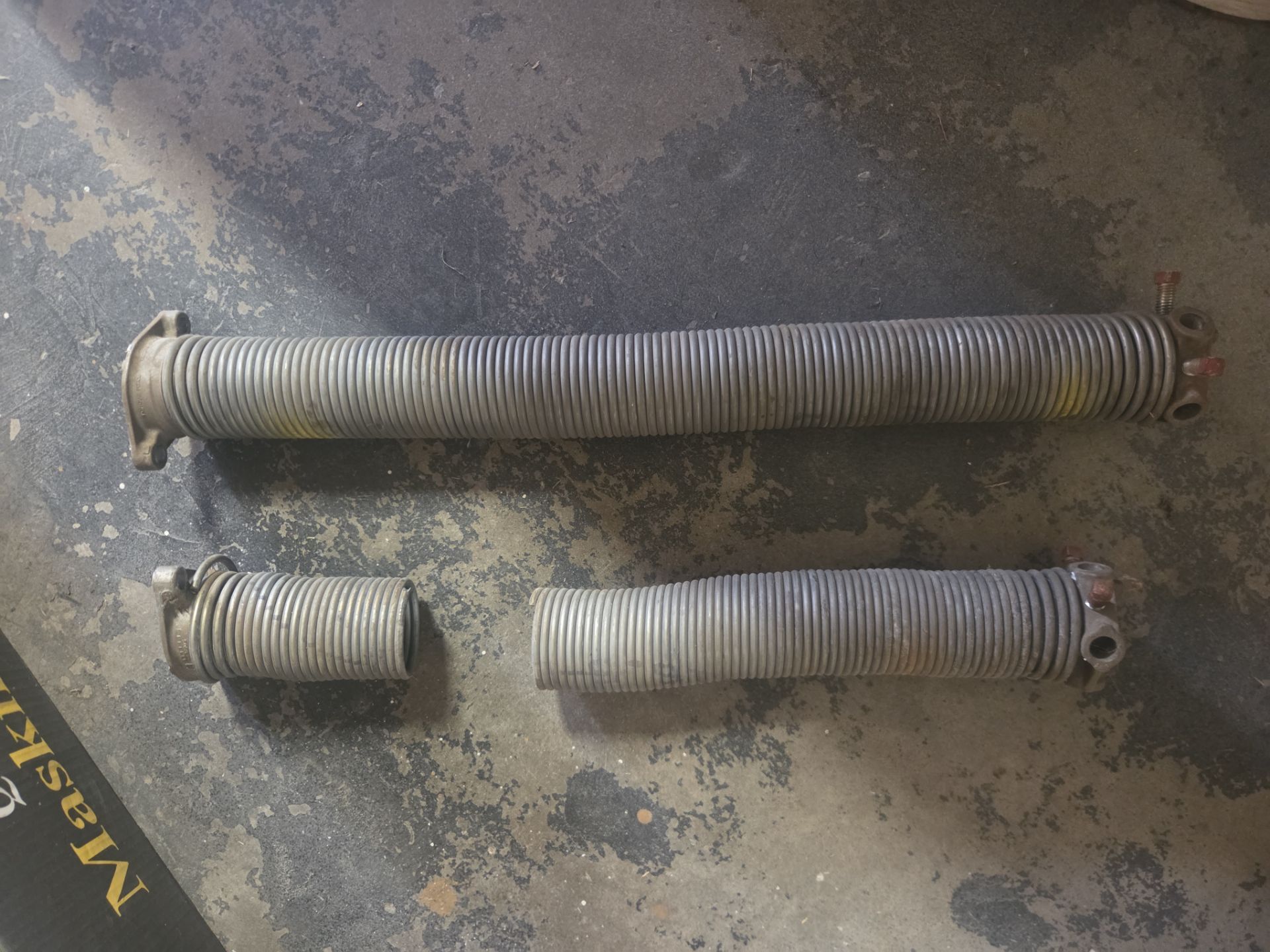 Residential Torsion Spring Replacement and System Calibration in Lathrop by Valiant Garage Door